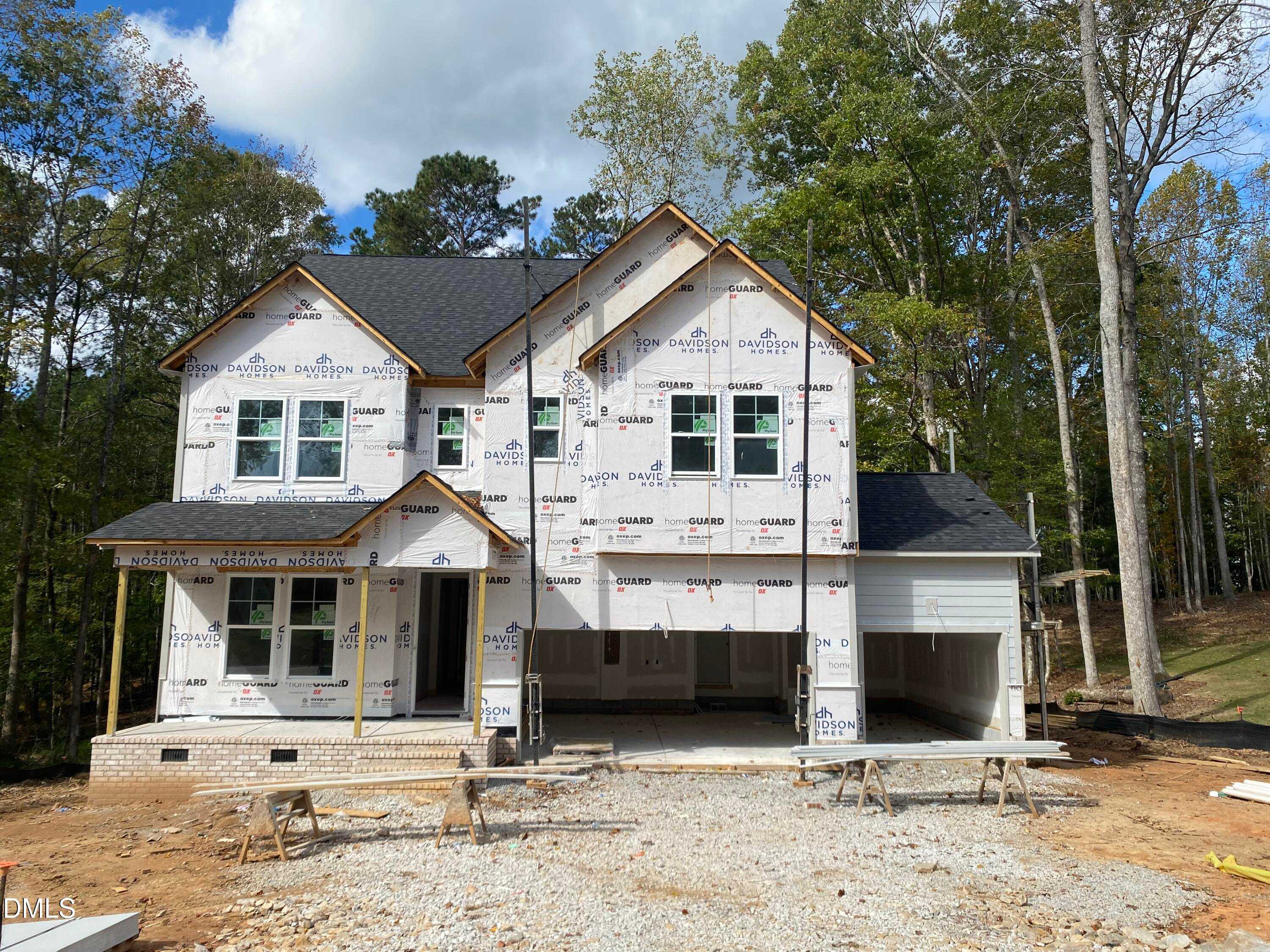 Davidson Homes The Beech B: 3-story 4-bedroom new build with 3-car garage and front porch in Laneridge Estates, Raleigh, NC