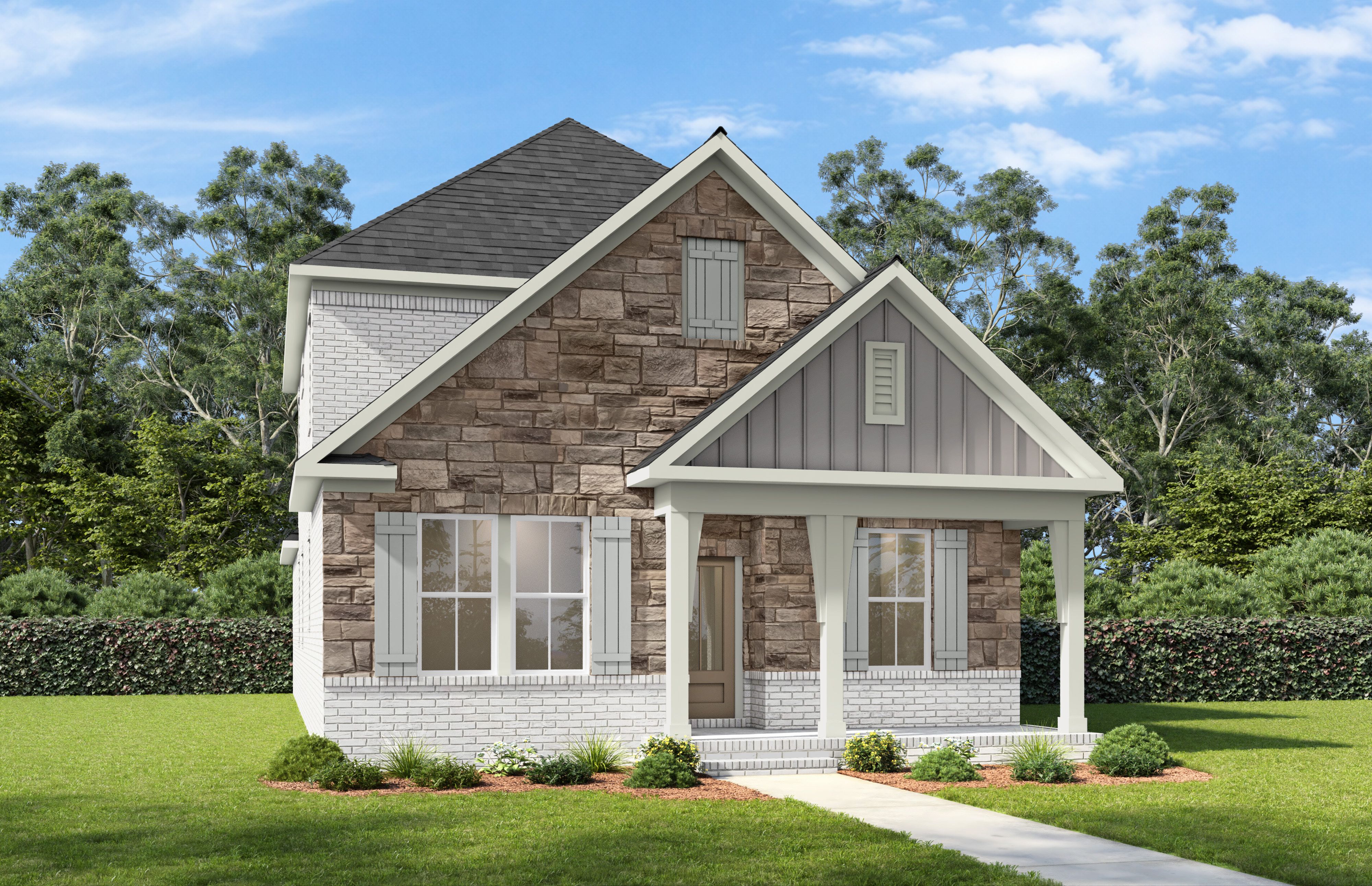 Front elevation of The Fairmont by Davidson Homes showcasing brick and stone exterior with covered porch in Mt. Juliet, TN