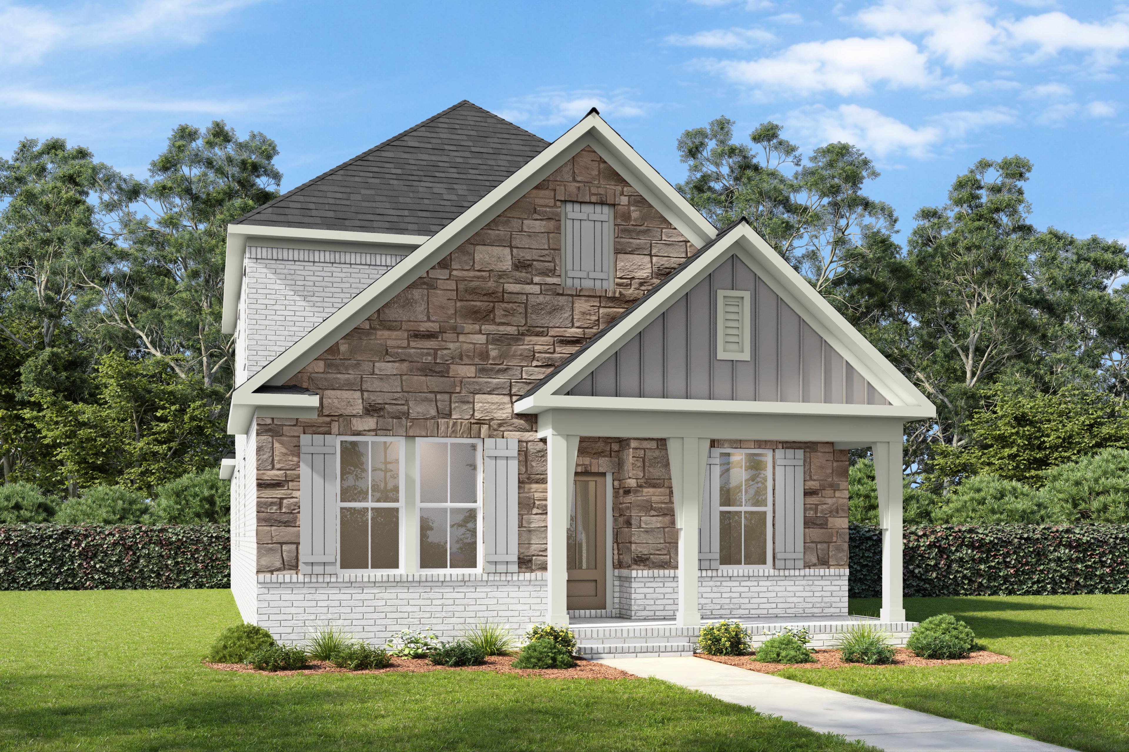 Front elevation of The Fairmont by Davidson Homes showcasing brick and stone exterior with covered porch in Mt. Juliet, TN