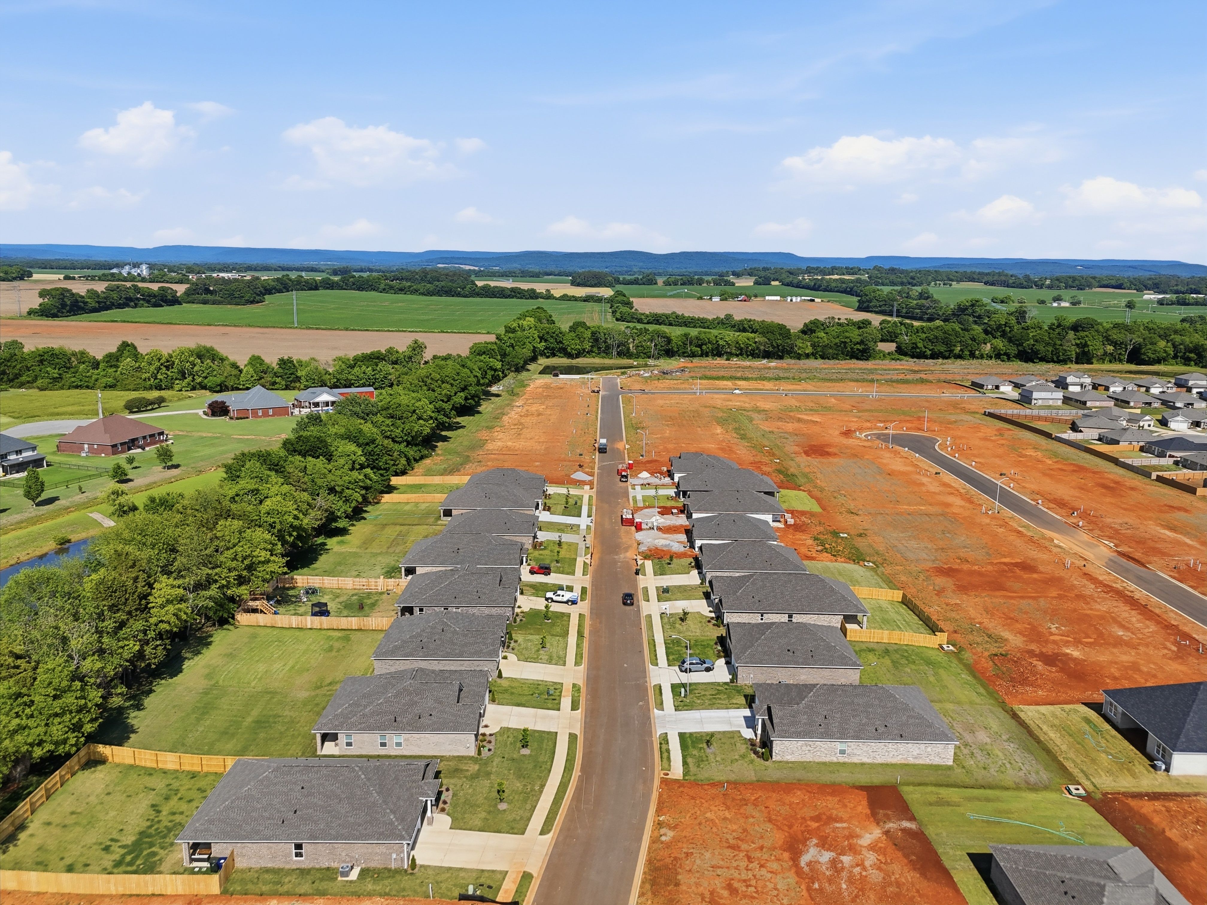 Aerial view of new Davidson Homes construction at Lynn Meadows in Meridianville, Alabama with ongoing residential development.