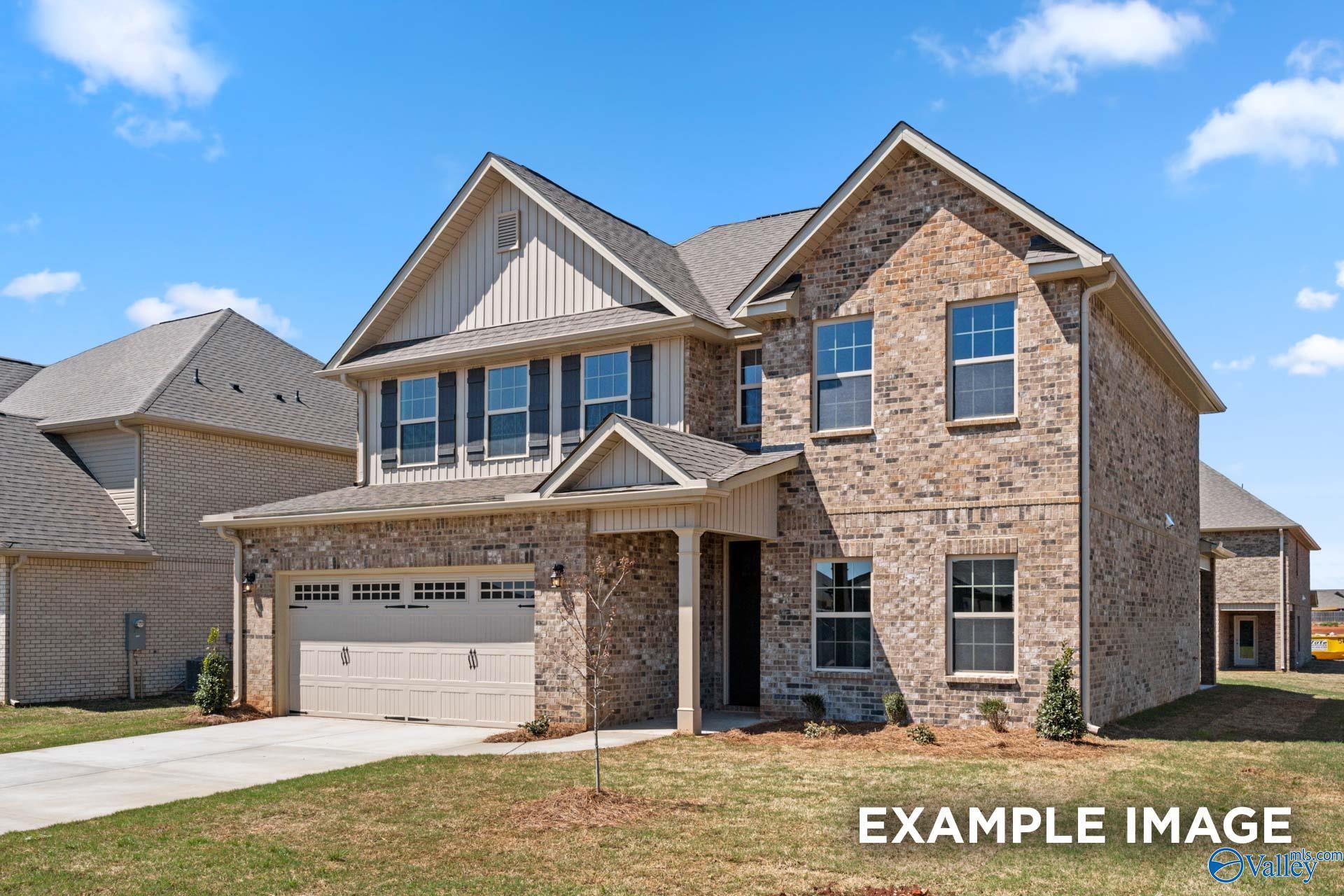 Two-story brick home with 2-car garage and driveway in Jaguar Hills, Huntsville, Alabama - Davidson Homes Shelby B