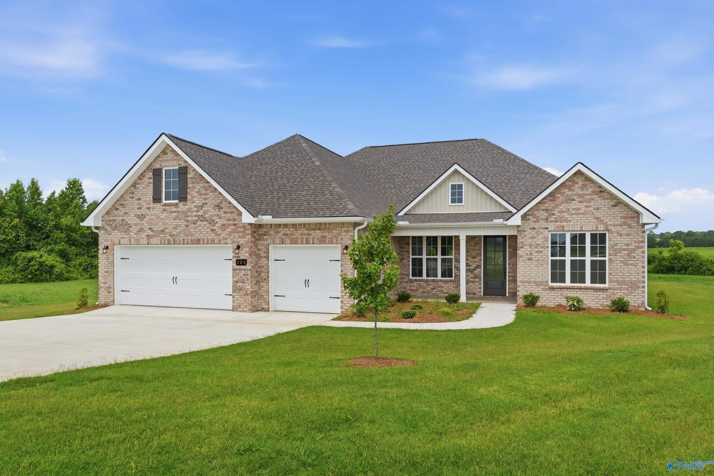 One-story Finleigh floor plan by Davidson Homes with a 3-car garage in Riverton Preserve, Huntsville, Alabama.