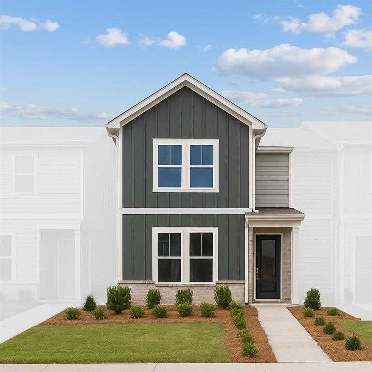 Modern two-story gray home with brick accents, black door, shrubs, and lush lawn in Stegall Village, Emerson, Georgia