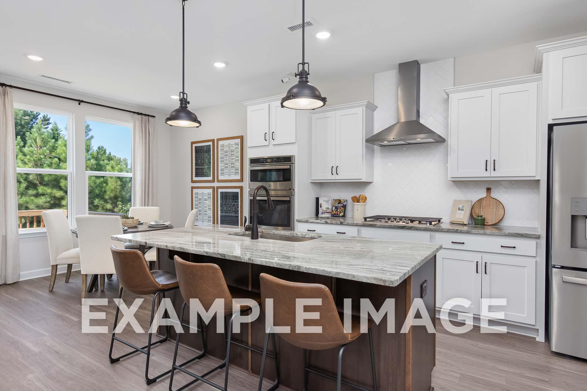 Bright Willow E kitchen by Davidson Homes featuring white cabinets, quartz island, leather stools, and window views