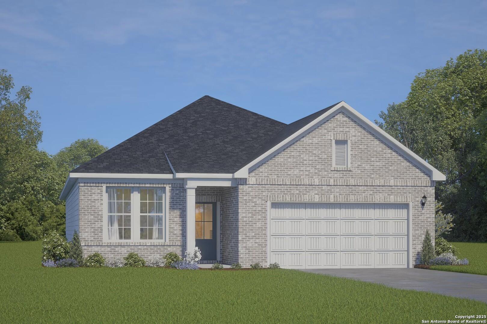 Single-story beige brick home with dark shingled roof, 2-car garage, and front porch in lush yard, The Glenwood I by Davidson Homes in Converse, Texas
