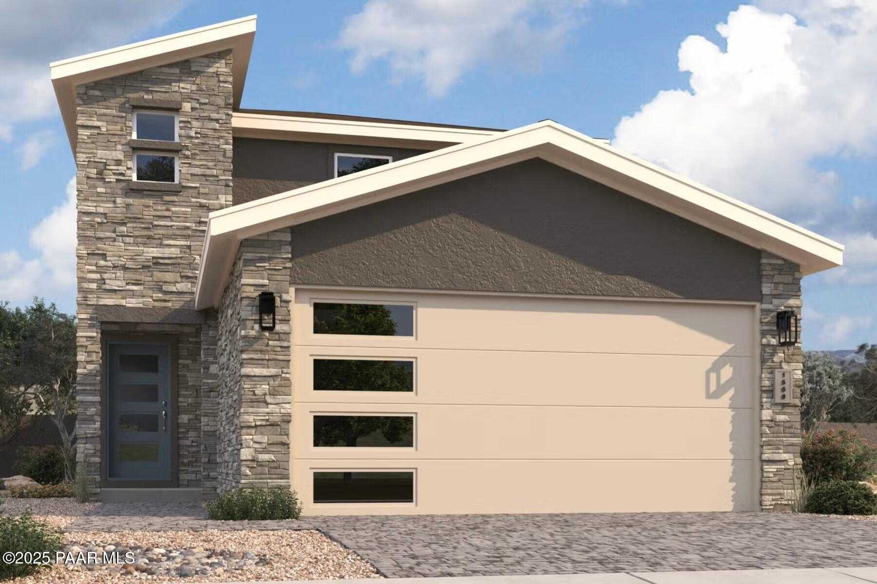 Modern 2-story Davidson Homes The Raleigh C with stone facade, 2-car garage, and desert landscape in South Ranch, Prescott, Arizona