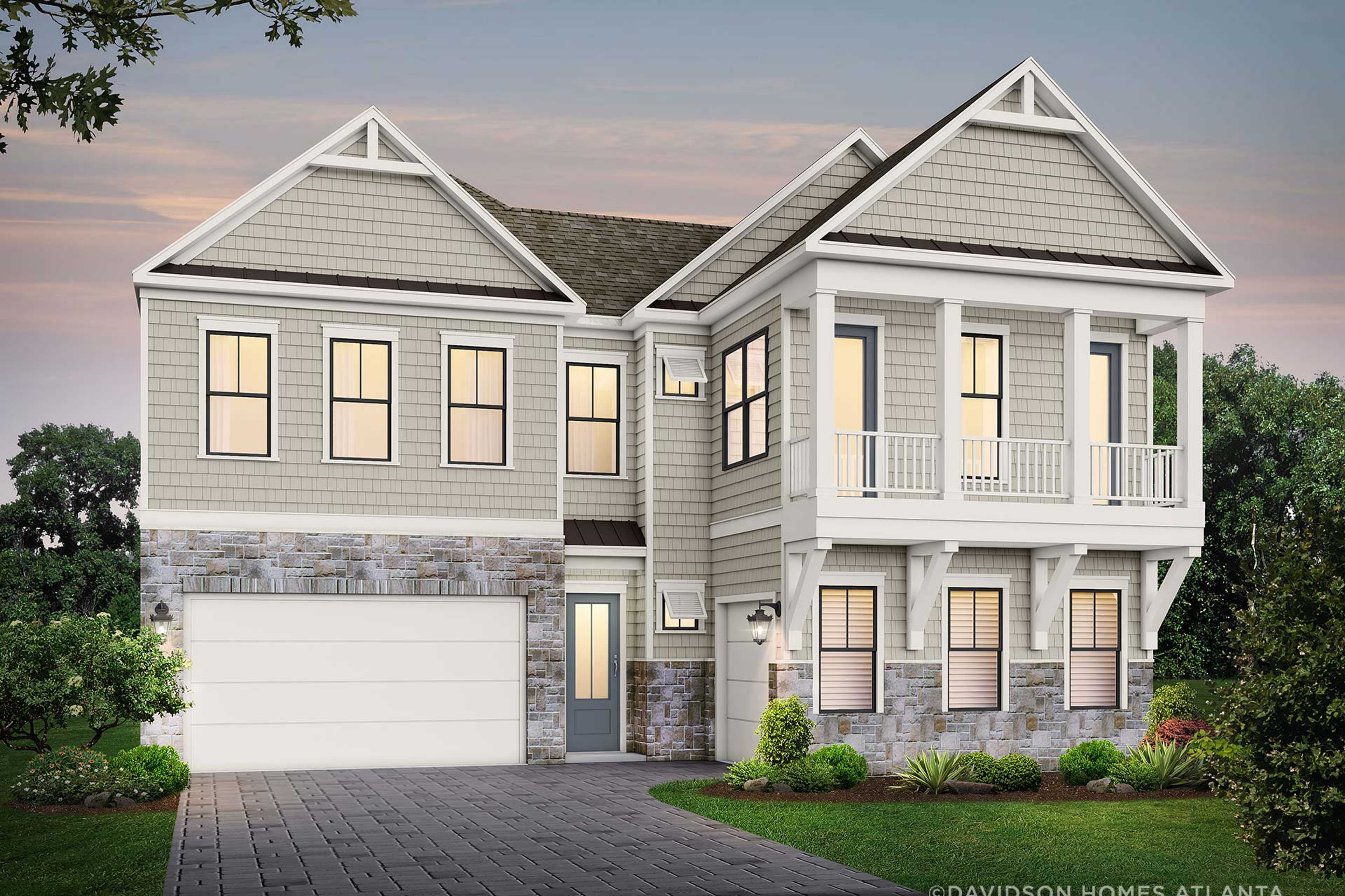 Two-story Seaside home elevation by Davidson Homes in Woodstock GA, with beige siding, stone base, upper balcony, 3-car garage, and landscaped front yard