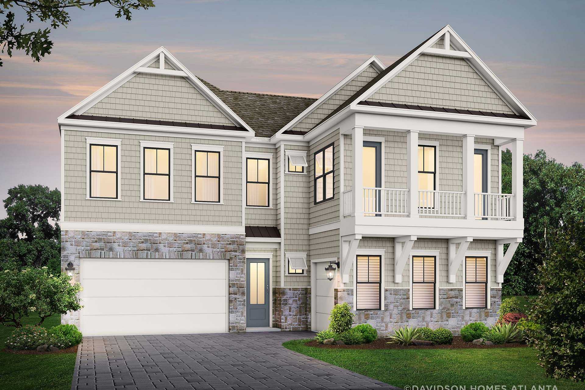 Two-story Seaside home elevation by Davidson Homes in Woodstock GA, with beige siding, stone base, upper balcony, 3-car garage, and landscaped front yard