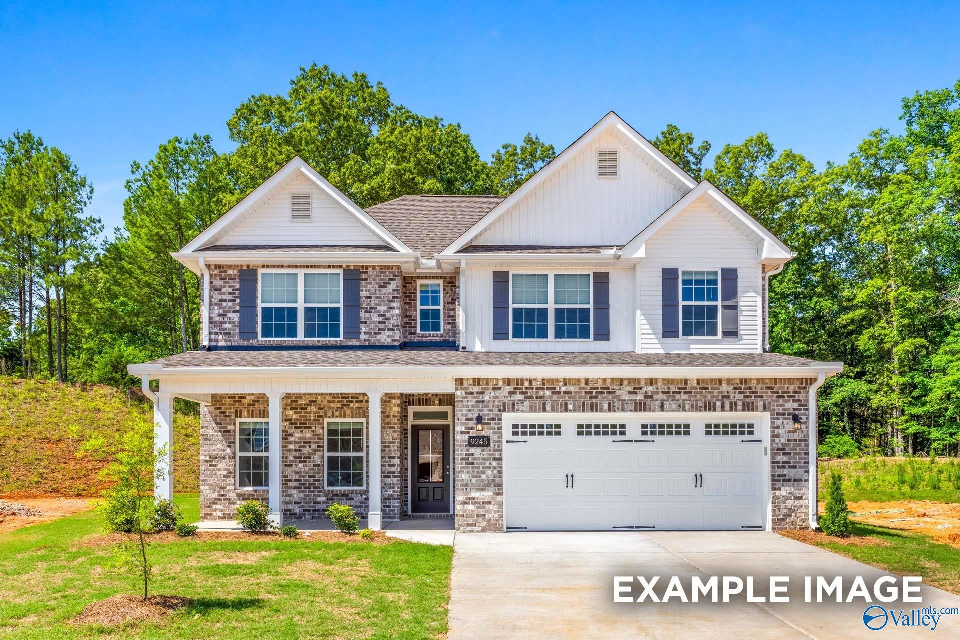Modern two-story 4-bedroom home with brick accents, blue shutters, front porch, and 2-car garage in Ramsay Cove, Owens Cross Roads, Alabama by Davidson Homes The Shelby B