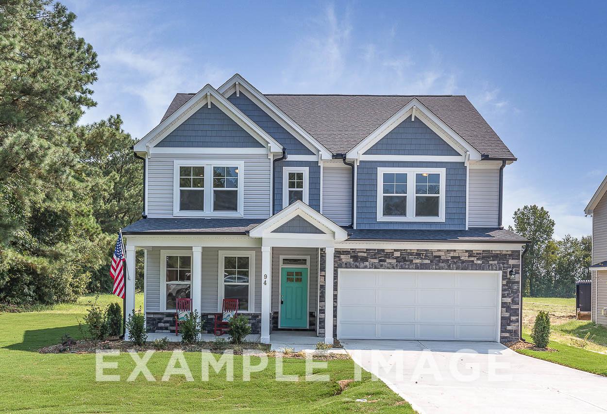 Davidson Homes the Chestnut Plan Front Exterior with Front Porch, Front Yard, and Driveway