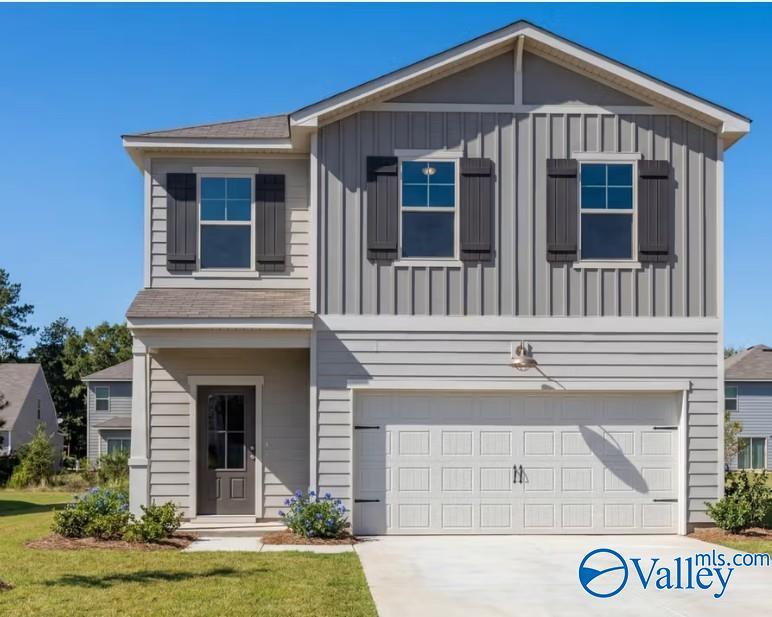 Two-story Rabun B home by Davidson Homes with 2-car garage in Bailey Park, Fayetteville, Tennessee.
