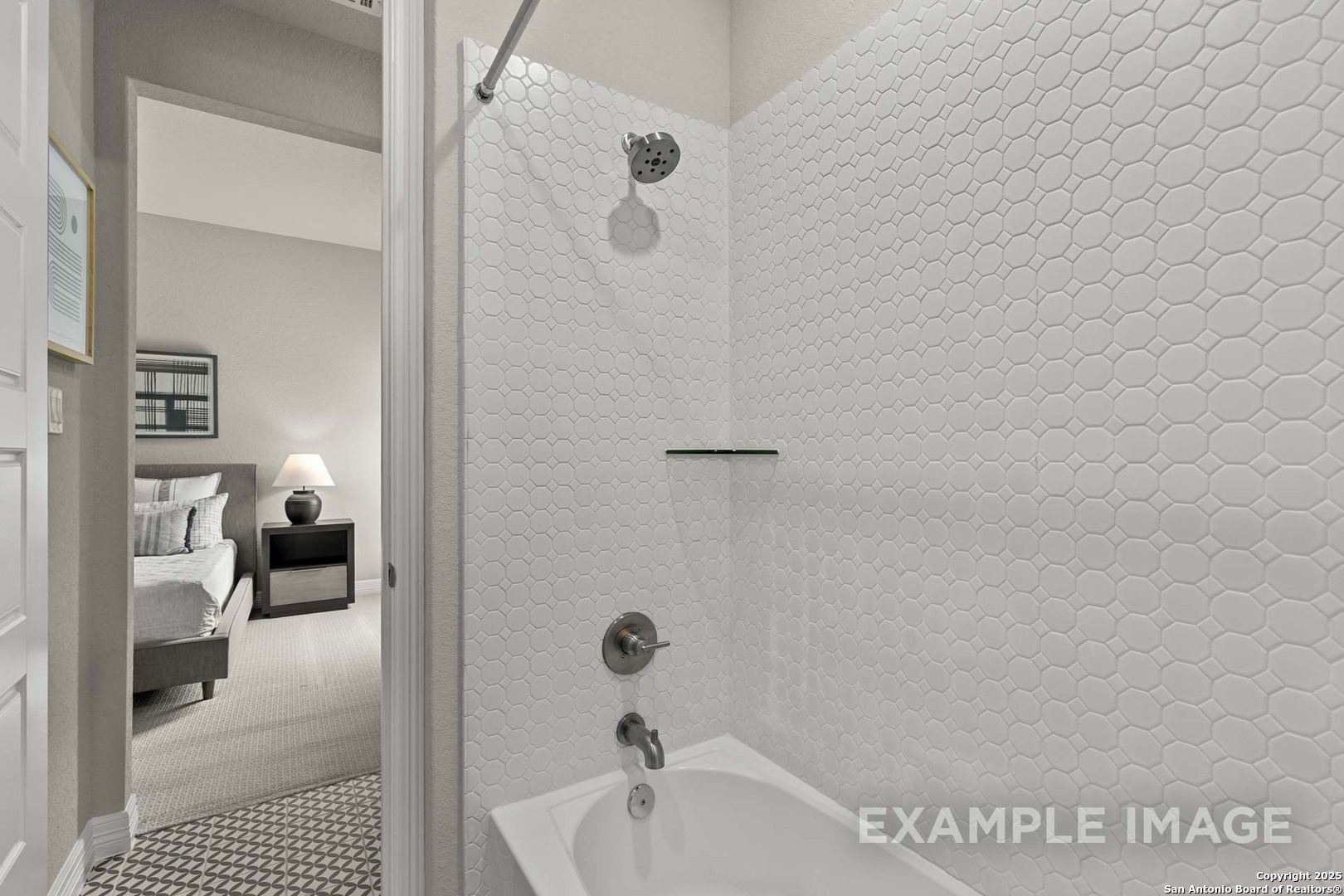 Modern white subway tile shower and soaking tub in master bath opening to bedroom, Davidson Homes Summerlin B, Castroville Texas