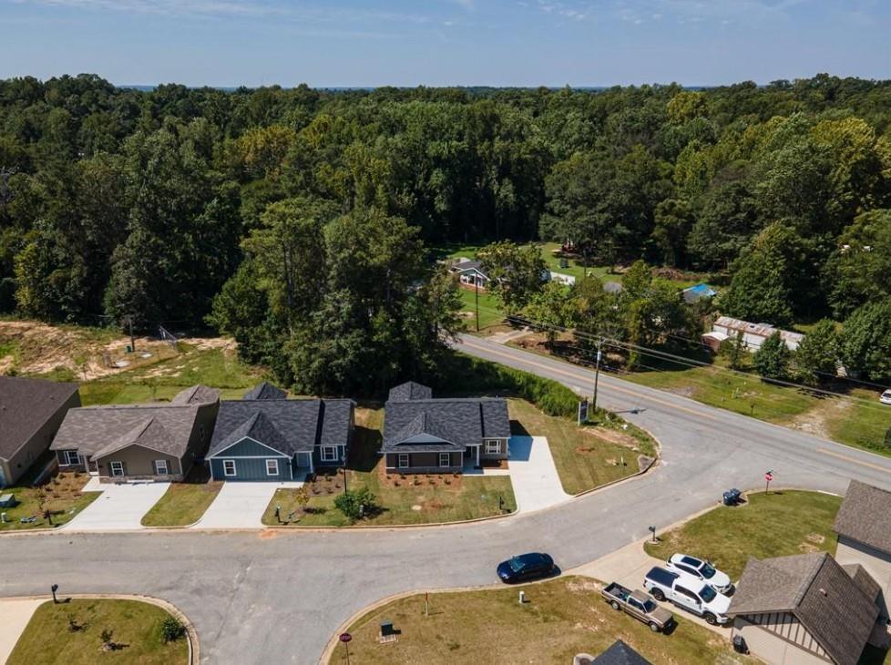 Aerial view of new Davidson Homes community in Summer Vineyard, Phenix City, Alabama, with The Washington floor plan amid wooded lots