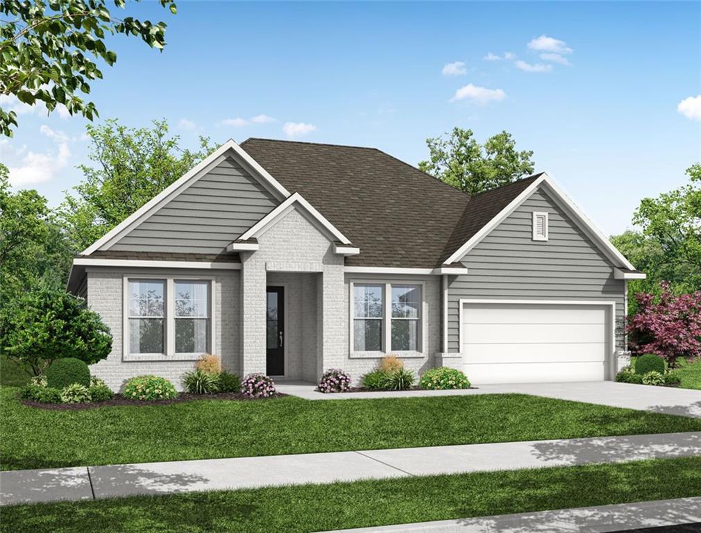 Modern 1-story Harrison H home exterior: gray brick siding, 2-car garage, landscaped yard in Wehunt Meadows, Hoschton, GA