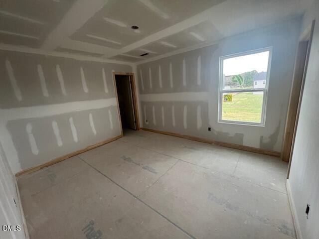Unfinished bedroom with drywall in The Hickory II C floor plan at Retreat at North Main in Lillington, North Carolina.