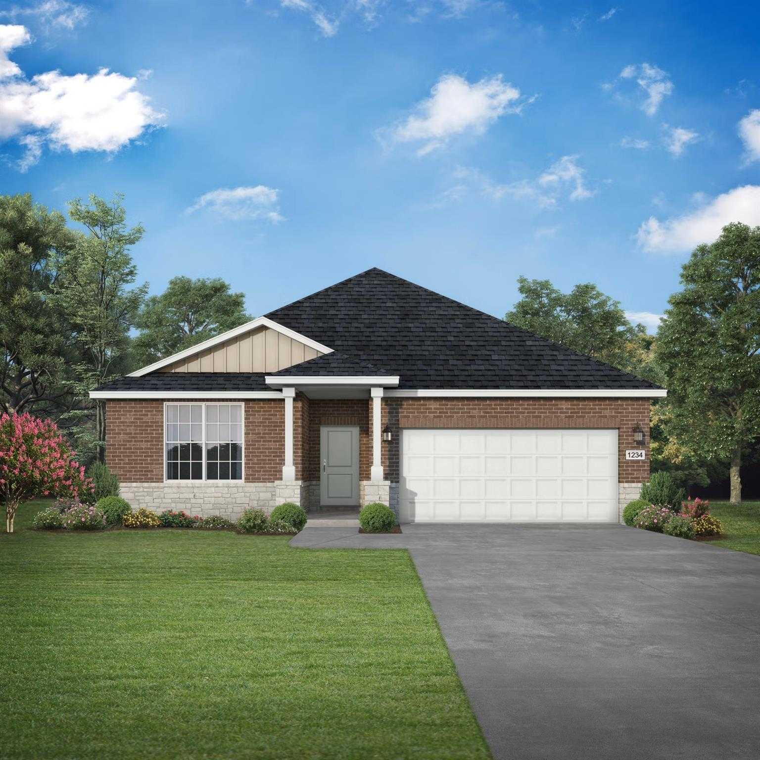 Modern brick single-story home with 2-car garage, front porch, and lush landscaping in Sundance Cove, Crosby, Texas - The Daphne F by Davidson Homes