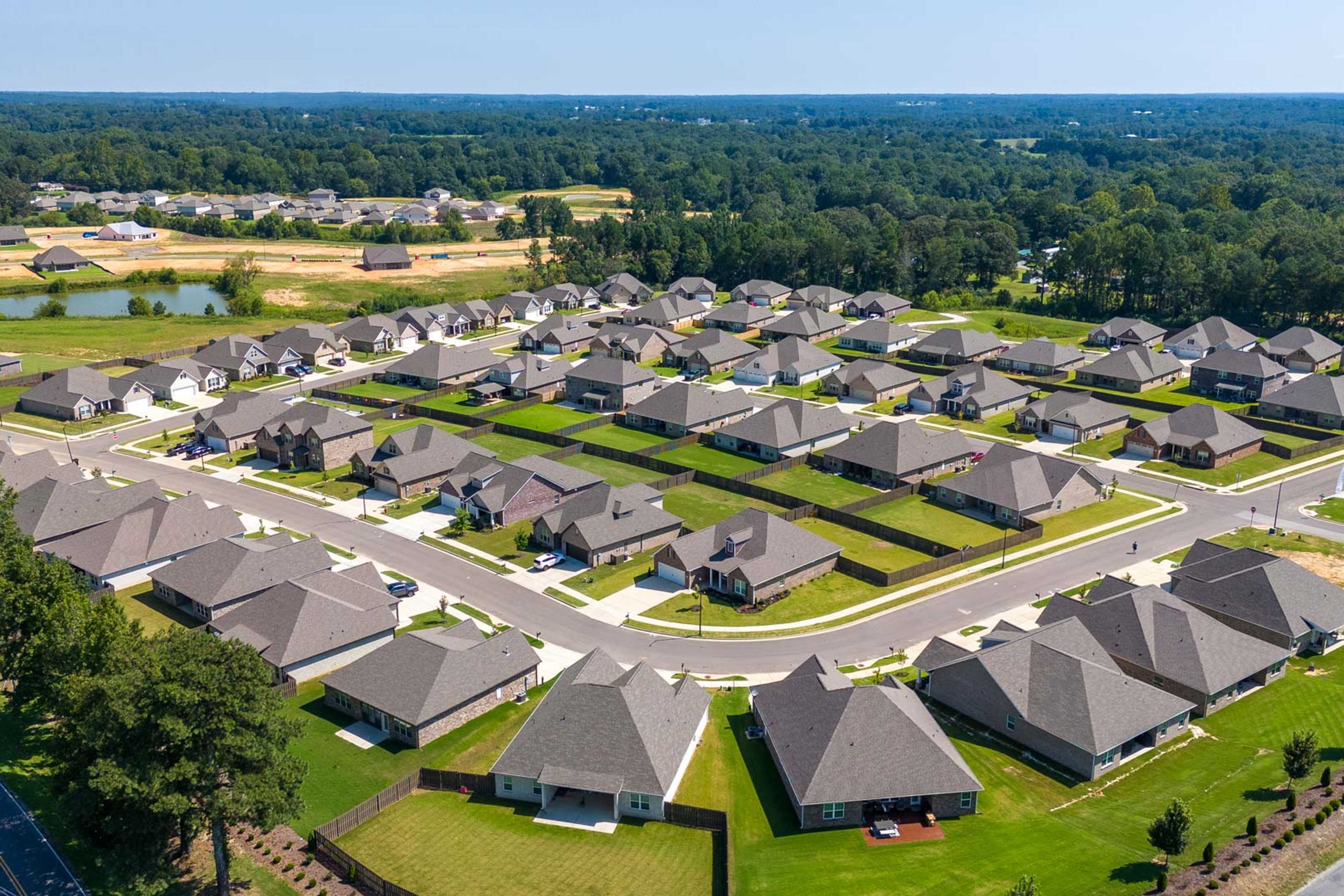 Aerial view of North Ridge neighborhood in Cullman Alabama featuring modern homes, green lawns, and tree-lined streets