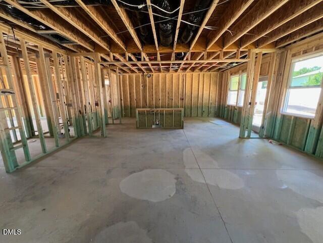 Open-concept construction framing of The Gavin A floor plan in Gregory Village, Lillington, North Carolina.