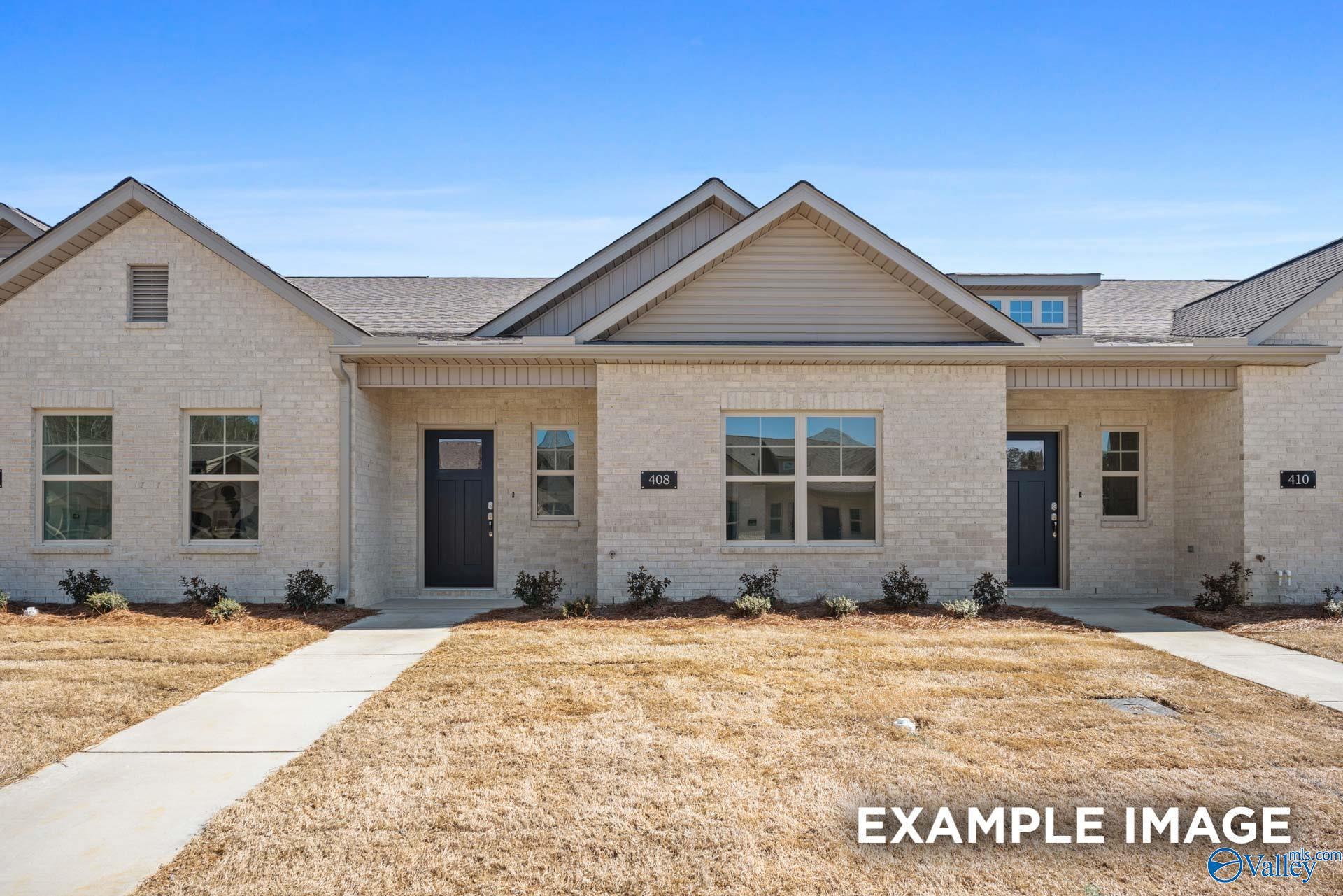 Modern brick exterior of The Camilla D floor plan by Davidson Homes in The Retreat at Cain Park, Hartselle, Alabama.