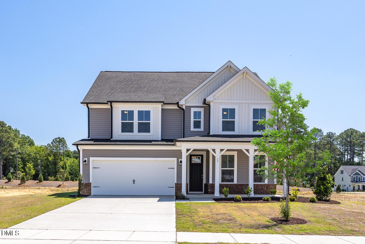 Two-story Chestnut B floor plan by Davidson Homes with 2-car garage in Retreat at North Main, Lillington, North Carolina.