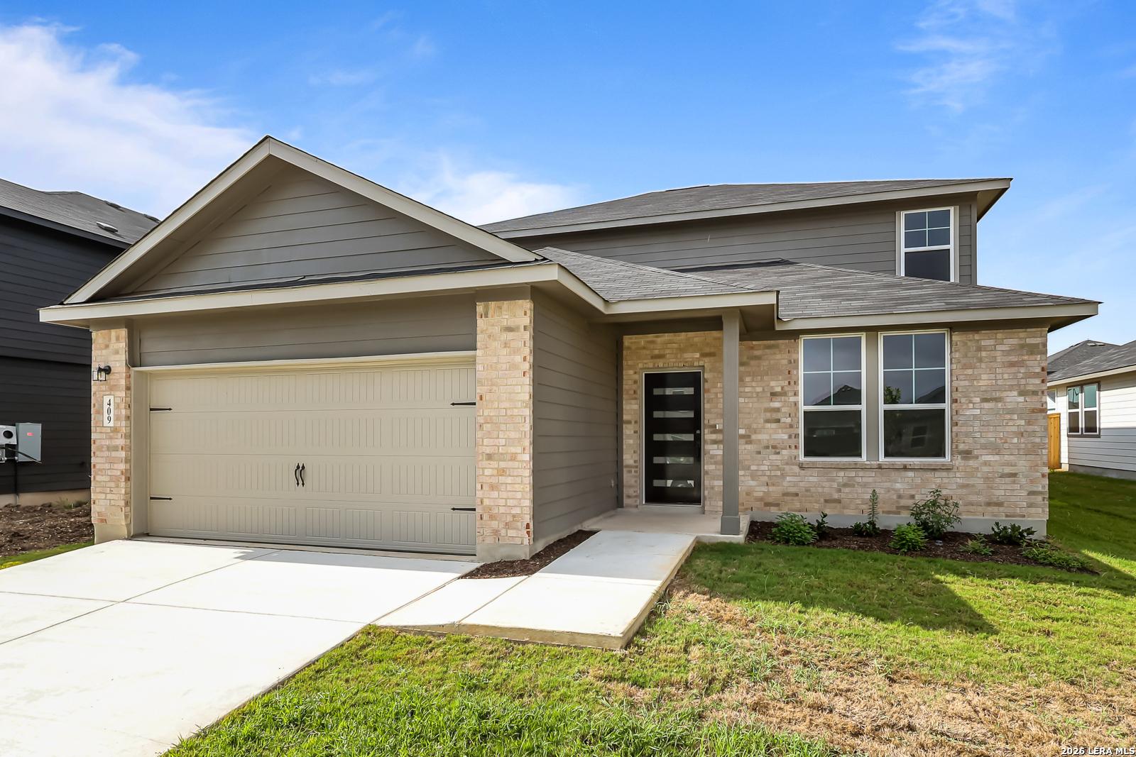 Two-story Douglas C floor plan by Davidson Homes with a two-car garage in Hannah Heights, Seguin, Texas.