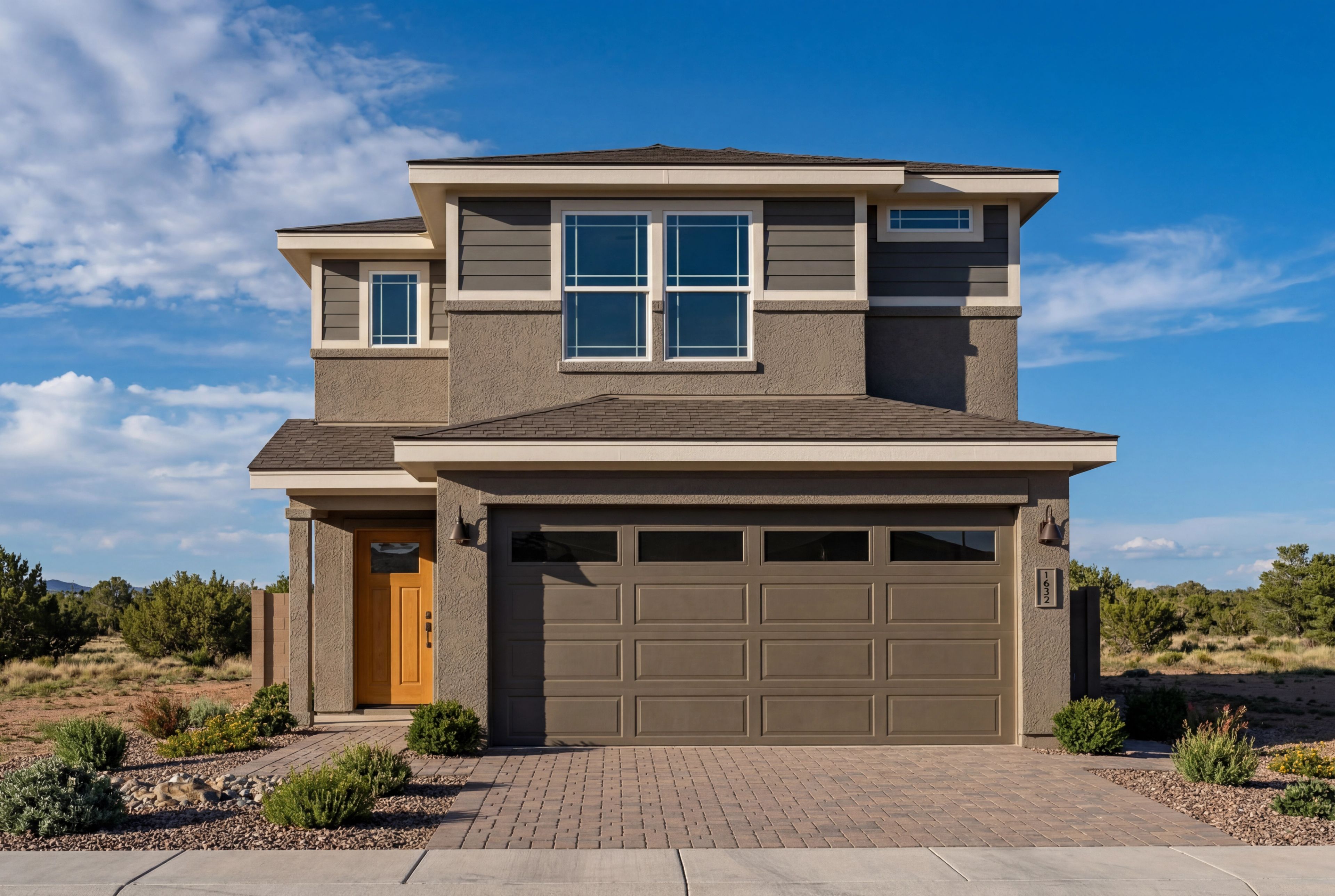 Two-story exterior elevation of The Augusta A by Davidson Homes featuring a modern stucco facade and multi-car garage.