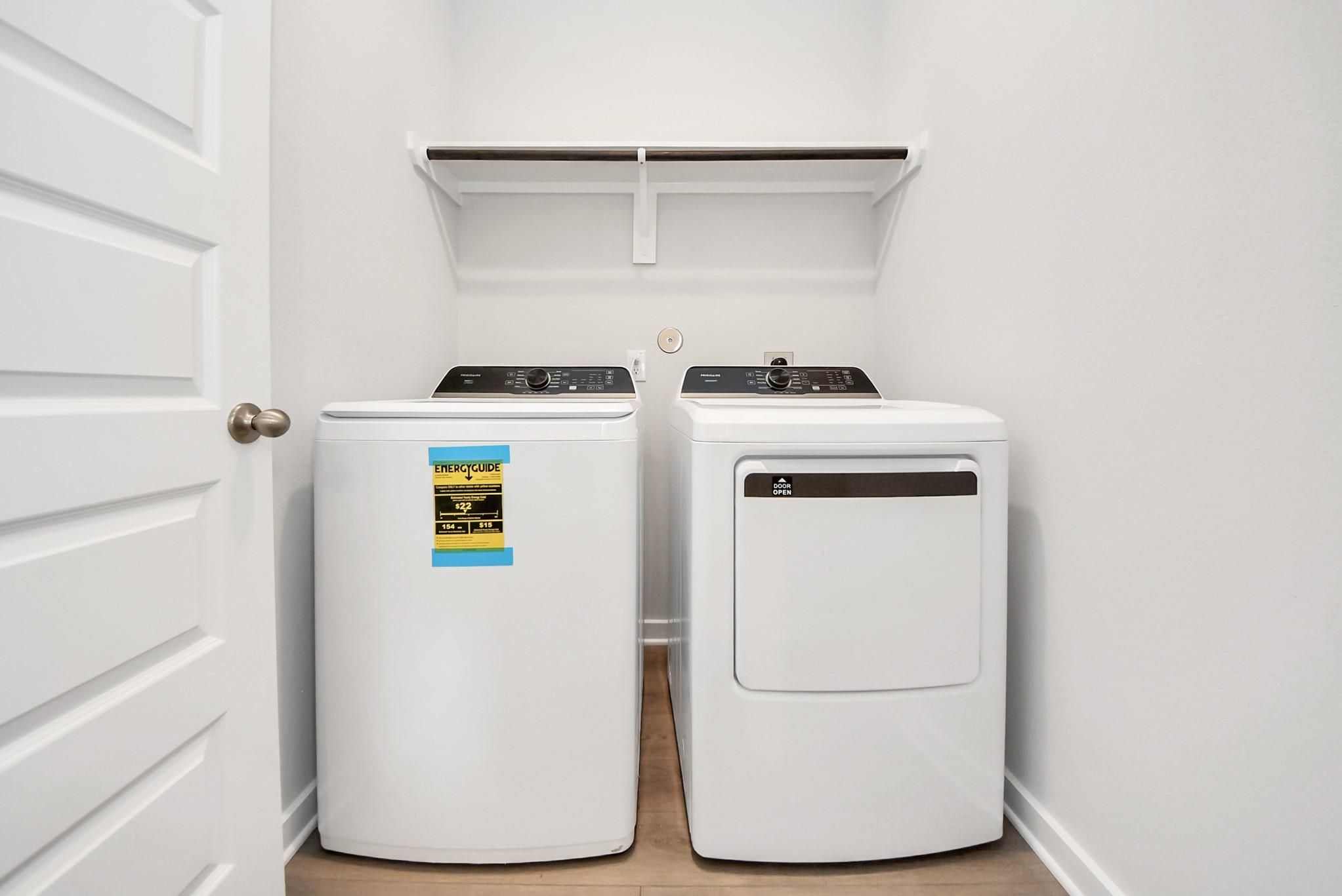 Laundry room with washer and dryer hookups in The Blanco E floor plan at The Villages at WestPointe, Dayton, Texas.