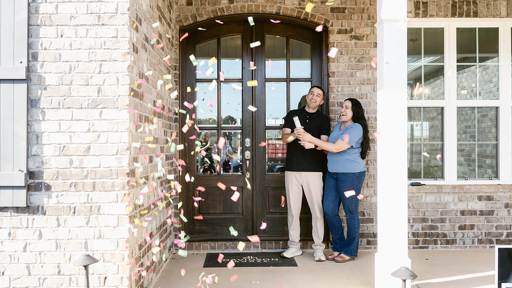 Smiling blonde woman in cozy home office attends Davidson Homes virtual homebuyer seminar on MacBook laptop with books and plants