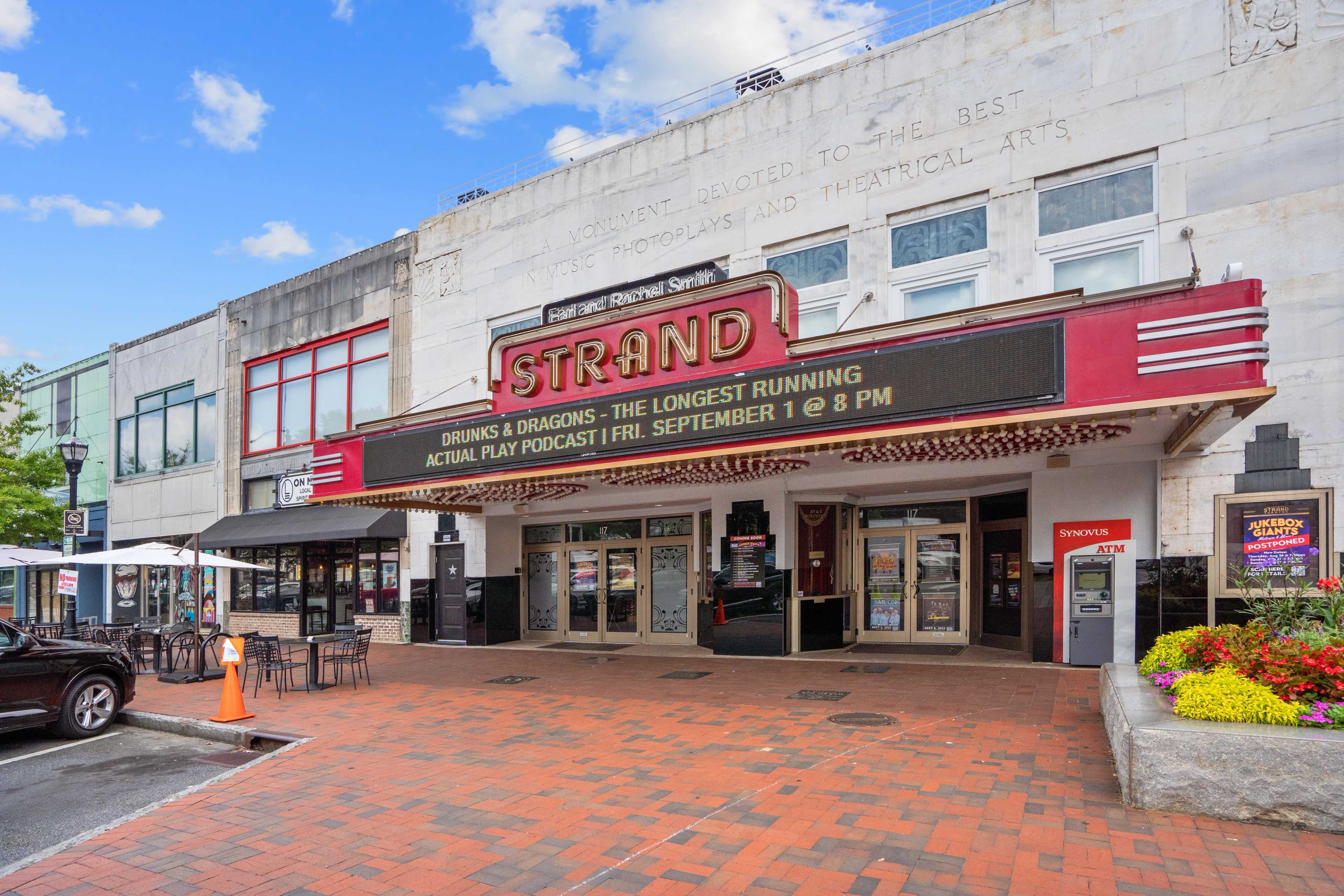 Historic Strand Theatre in Marietta, Georgia with Art Deco facade and marquee for "Drinks and Dragons" play