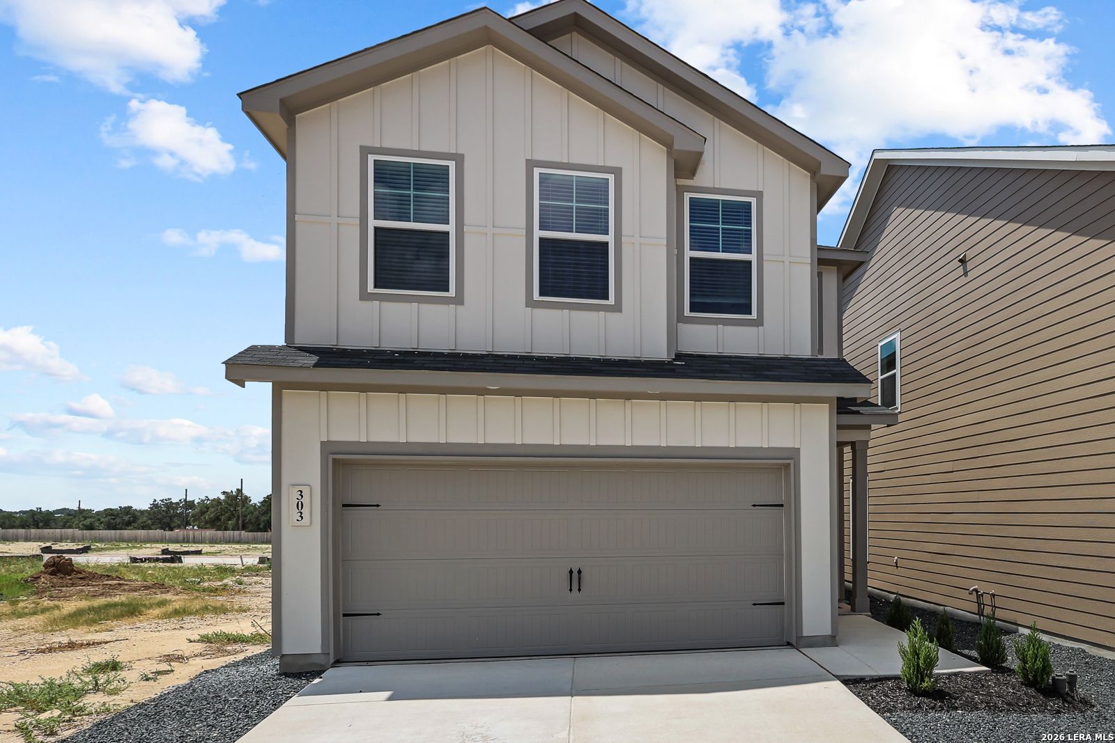 Two-story Gillian C floor plan by Davidson Homes with a 2-car garage in Meadows at Oak Creek, San Antonio, Texas.