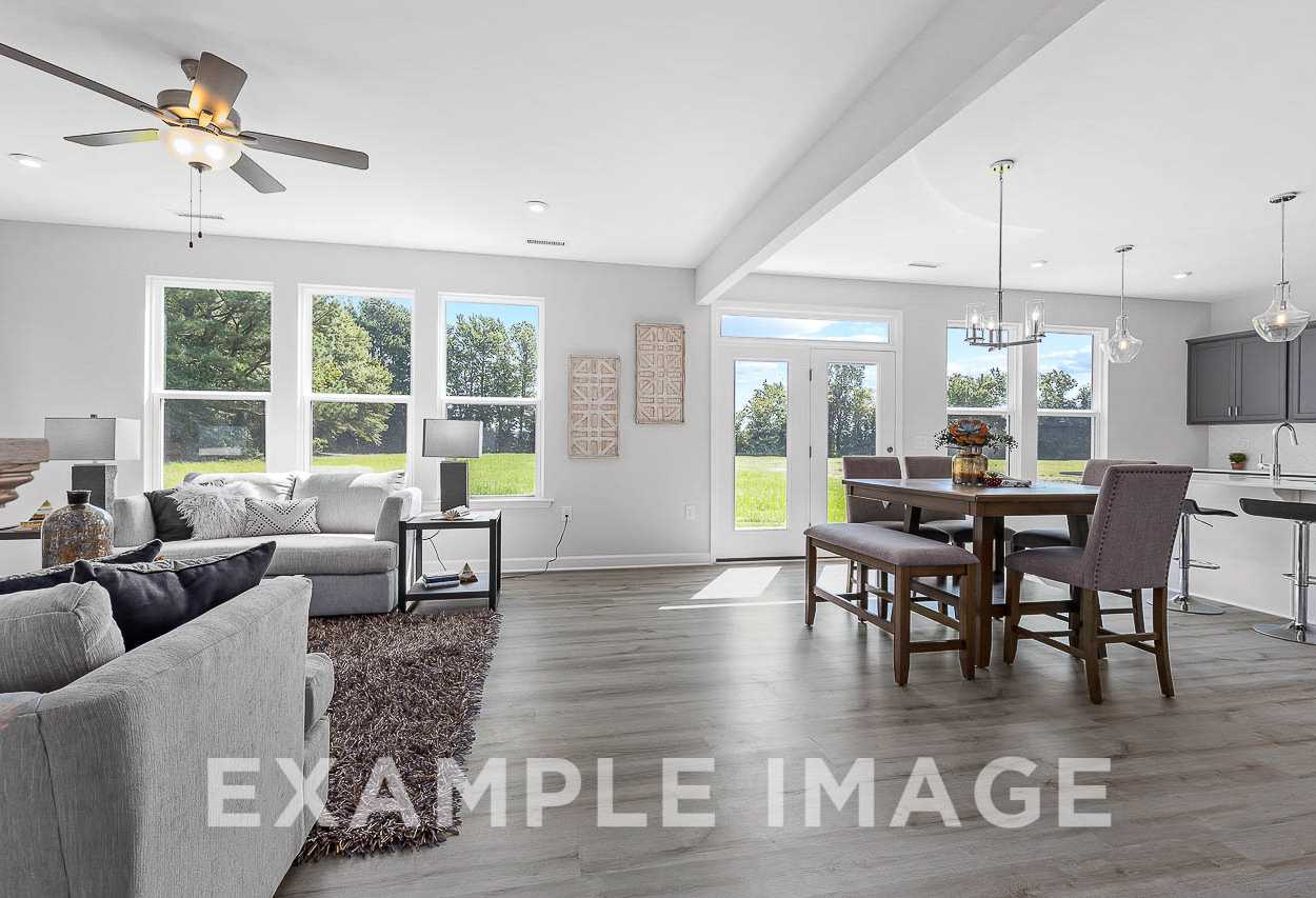 Davidson Homes the Chestnut Plan living and dining area with furniture