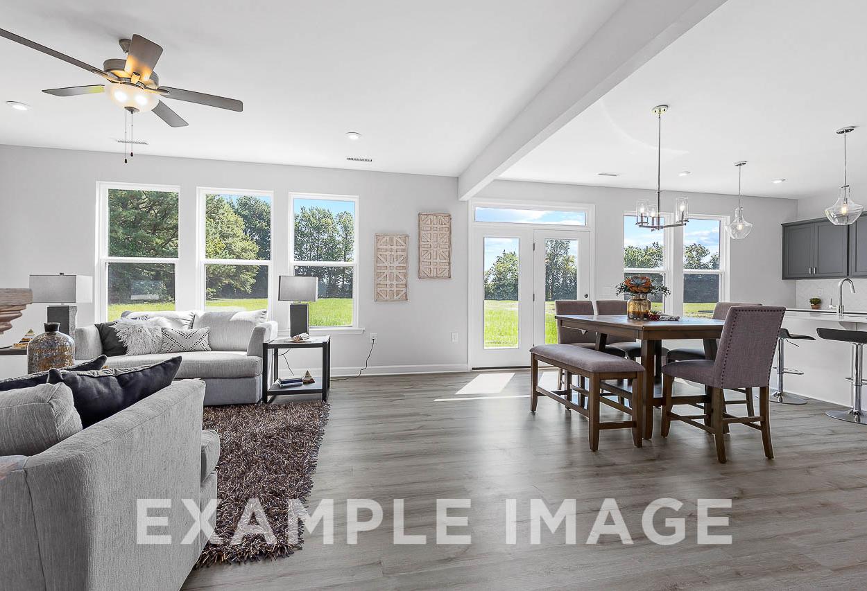 Davidson Homes the Chestnut Plan living and dining area with furniture