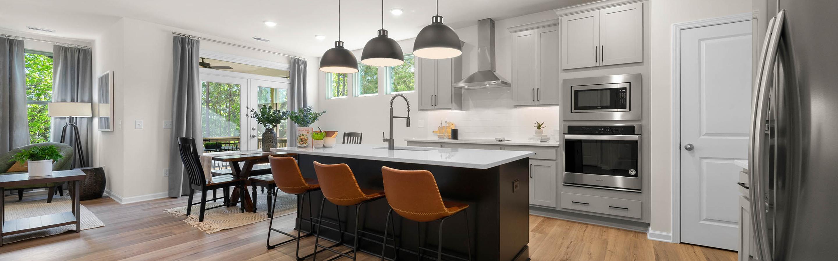 Kitchen and Living room Inside Davidson Homes' Rosemary Beach plan