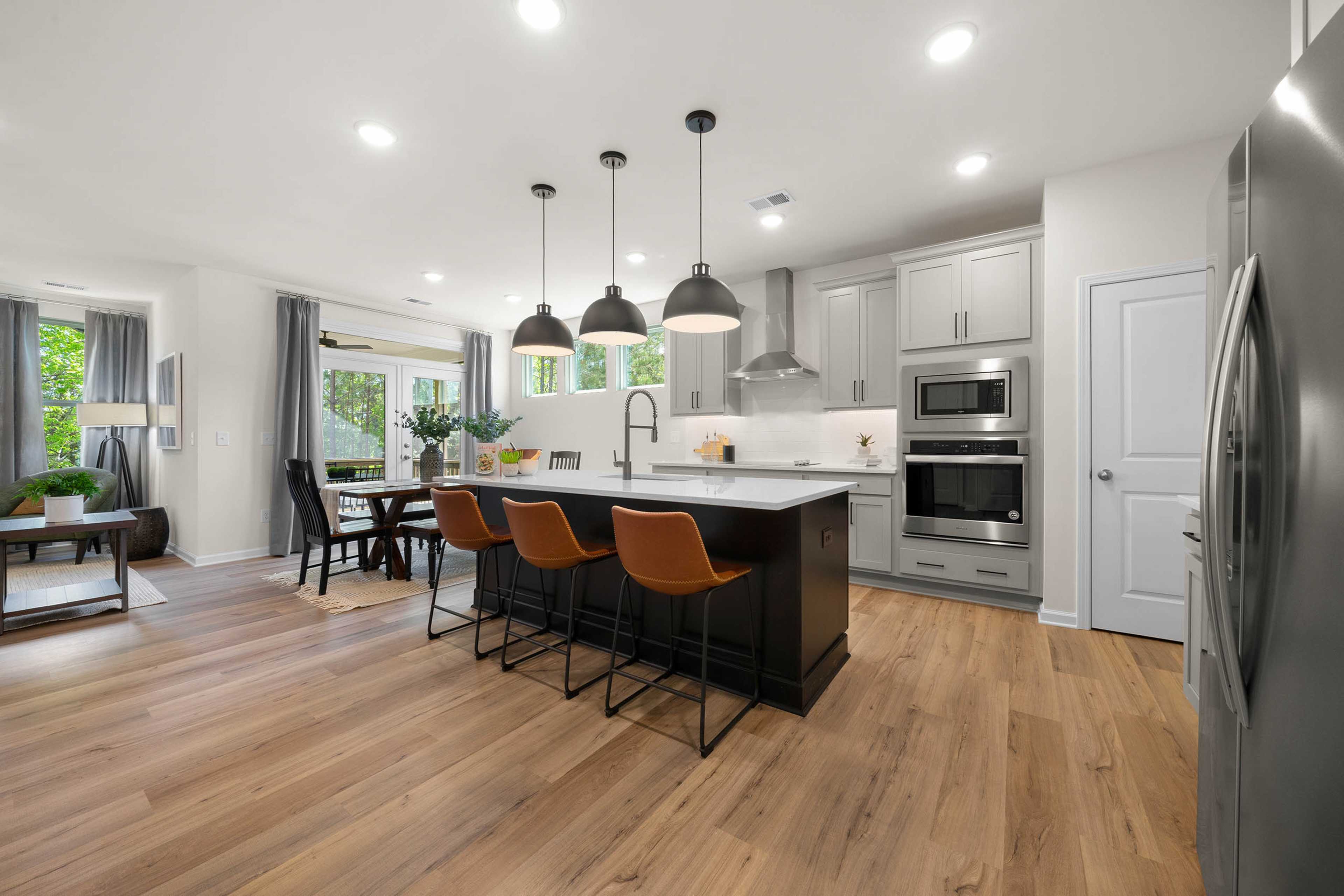 Kitchen and Living room Inside Davidson Homes' Rosemary Beach plan