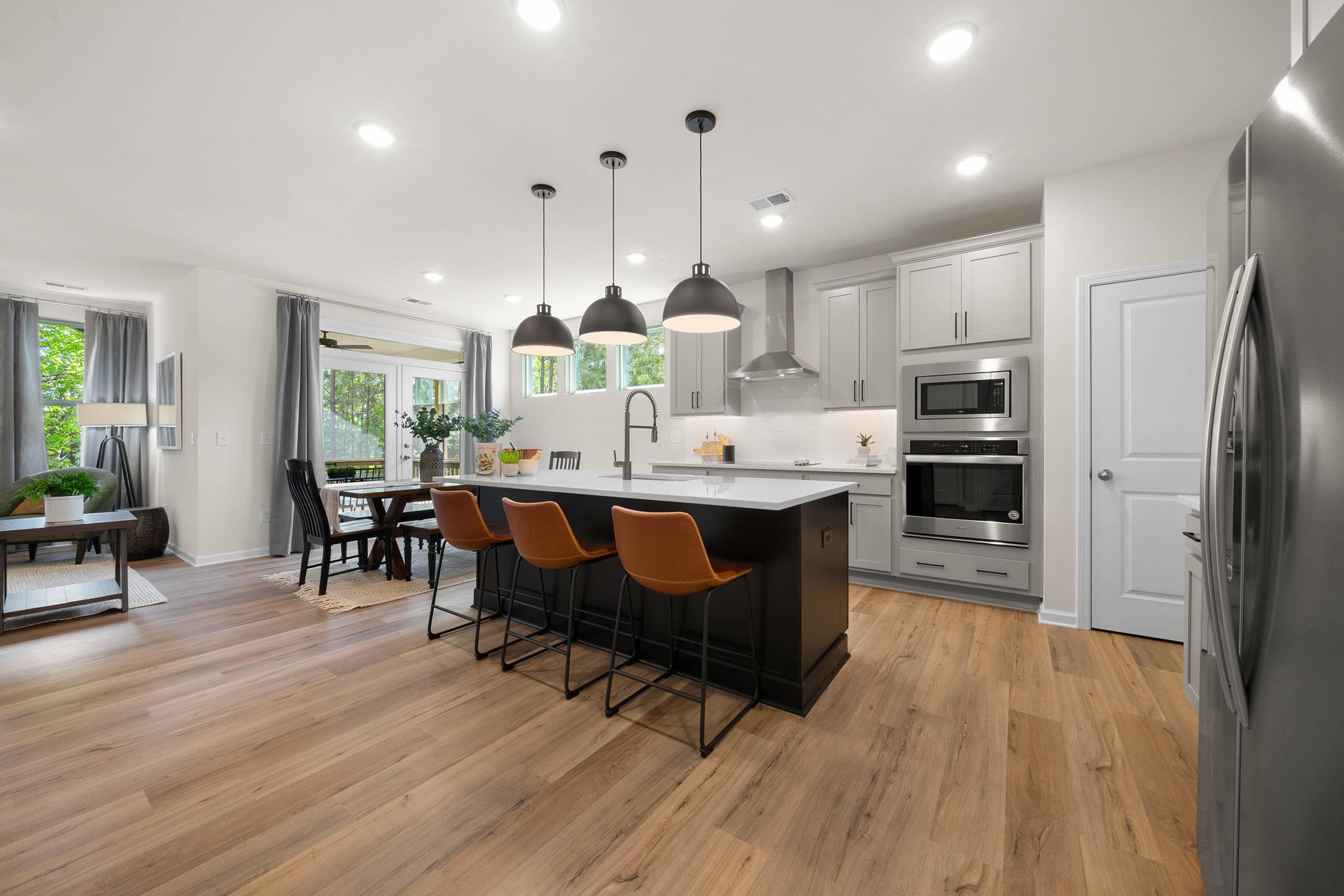 Kitchen and Living room Inside Davidson Homes' Rosemary Beach plan