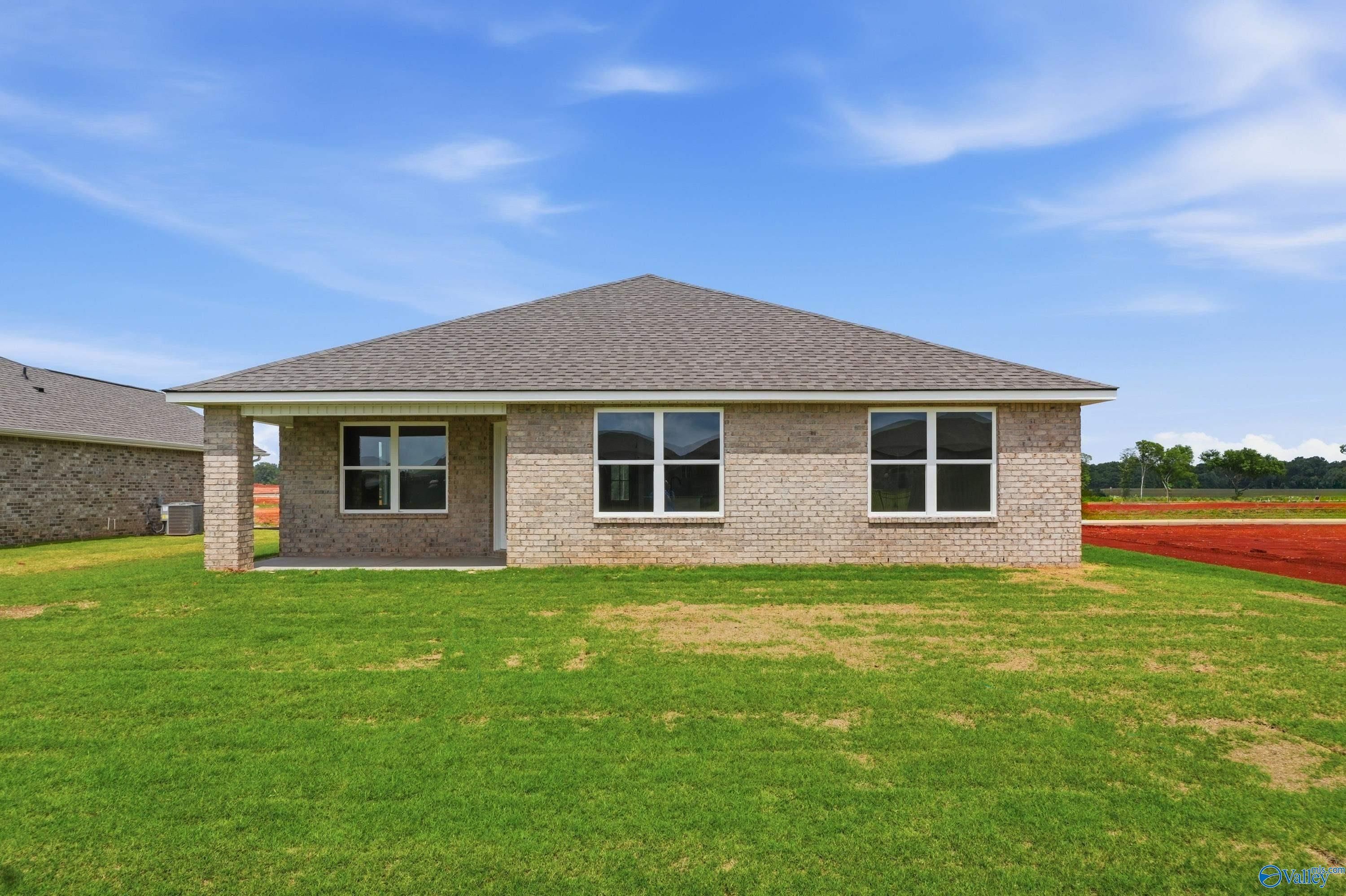 Brick exterior of The Franklin floor plan by Davidson Homes in Heritage Lakes, New Market, Alabama.