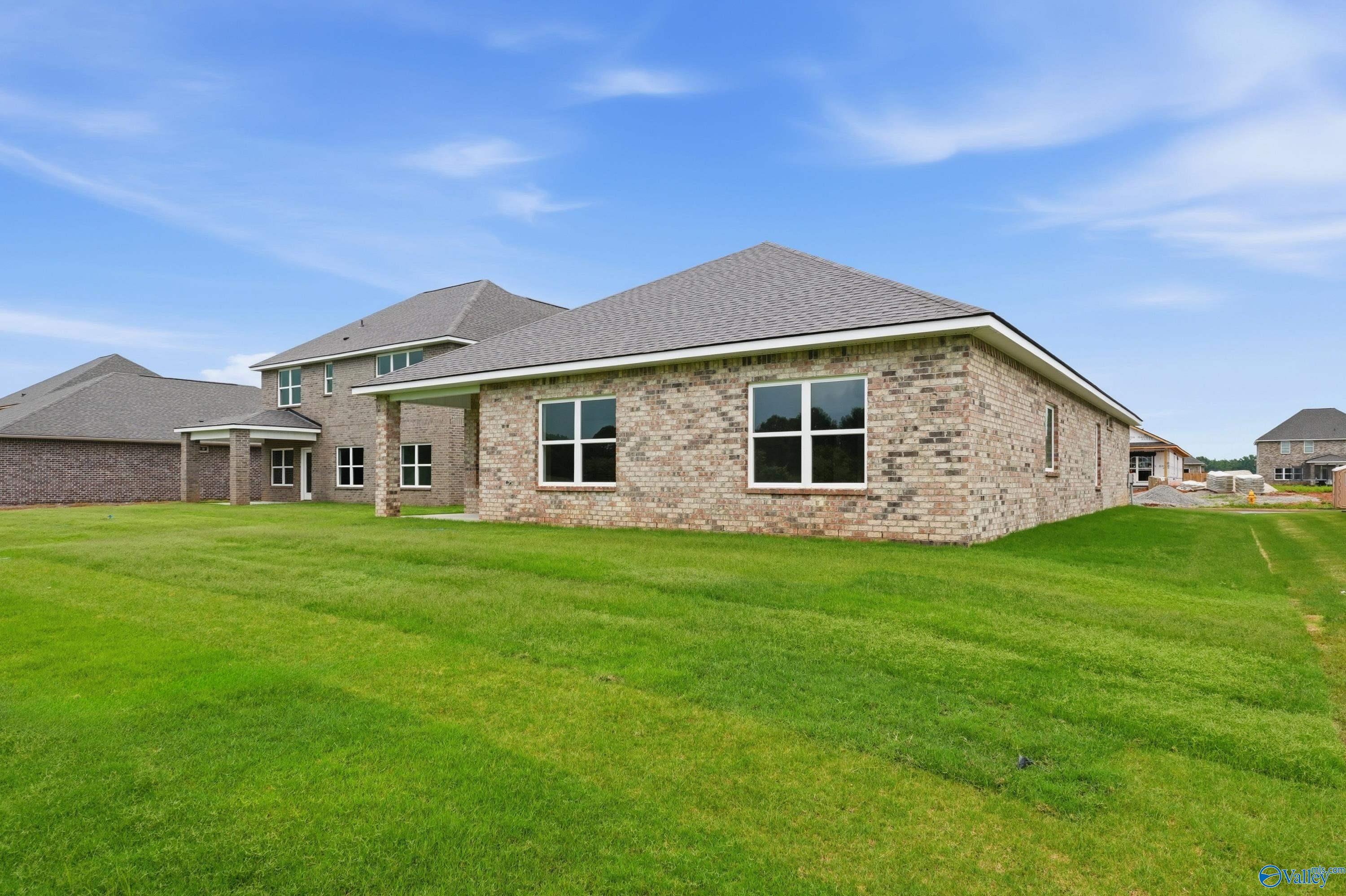 Rear exterior view of The Daphne C floor plan by Davidson Homes in Ivy Hills, Toney, Alabama.