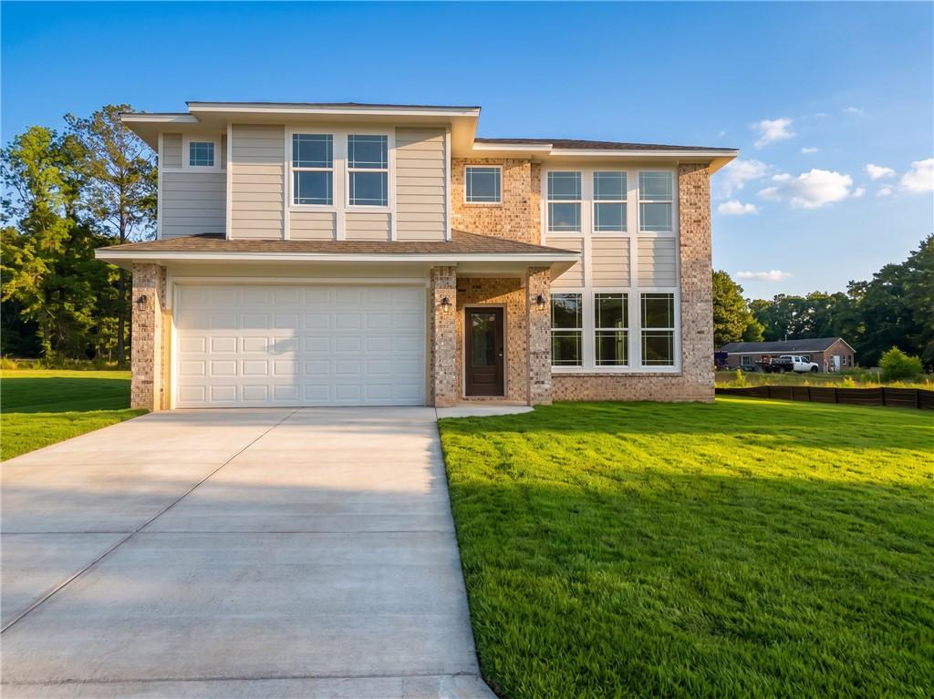 Two-story Stella C floor plan by Davidson Homes with 2-car garage in Links Crossing, Auburn, Alabama.
