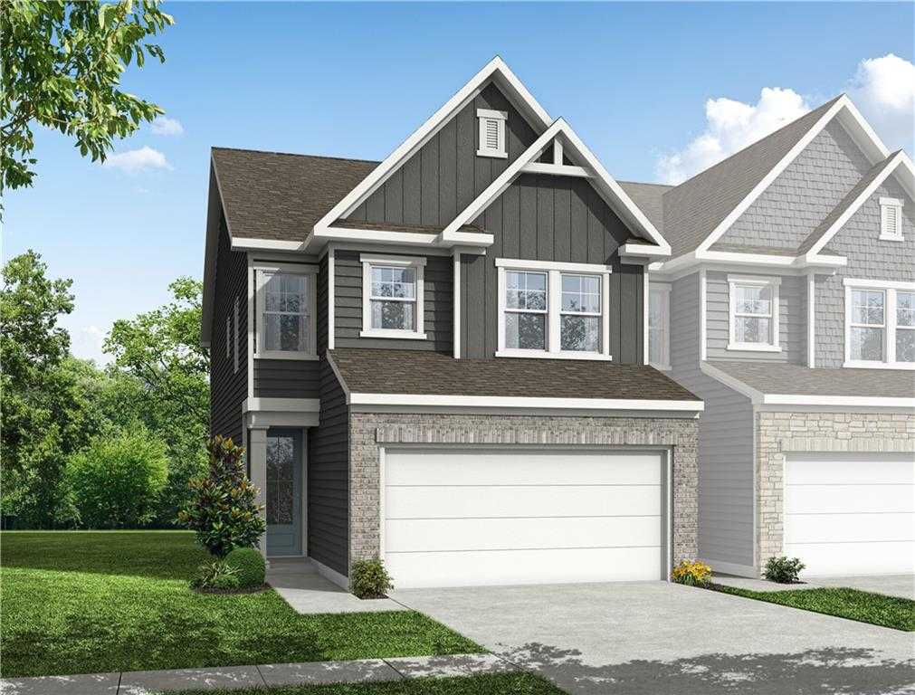 Modern 2-story Cary A home by Davidson Homes: dark gray siding, brick accents, 2-car garage in Lake Shore, Winder, GA