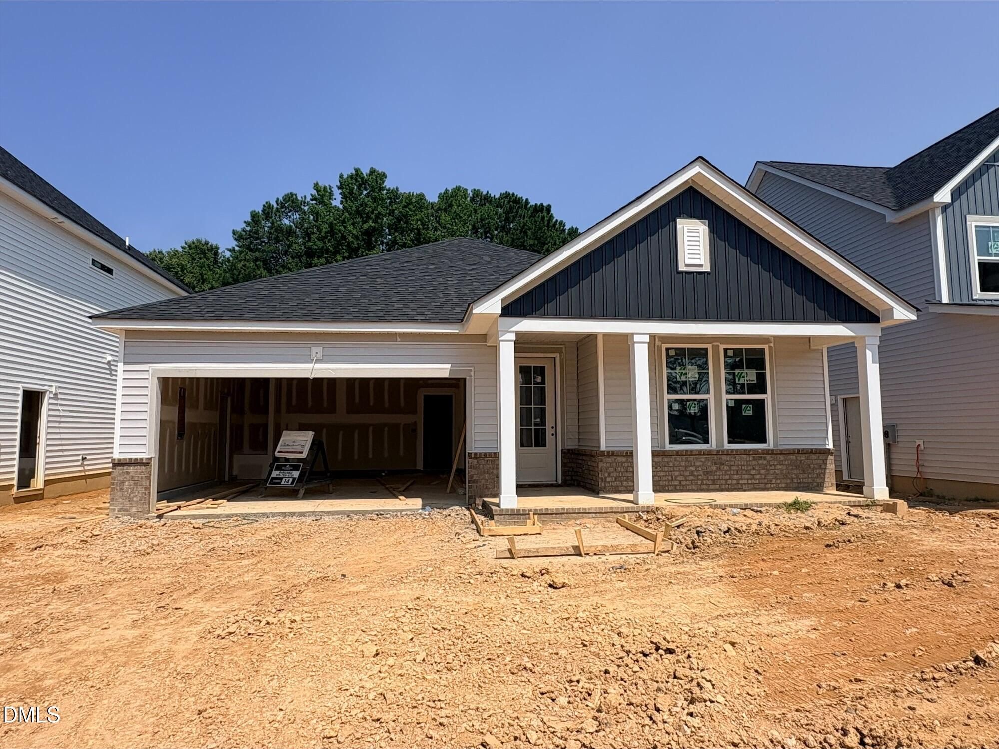 New construction Daphne D floor plan by Davidson Homes in Woodland Crossing, Zebulon, NC with 2-car garage.