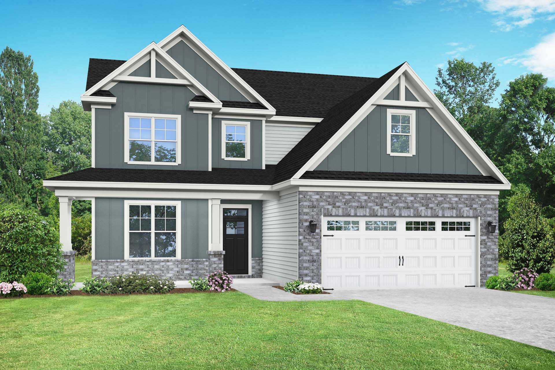 Two-story The Ash E home elevation in Angier NC, gray siding with stone accents, front porch, two-car garage, lush landscaping