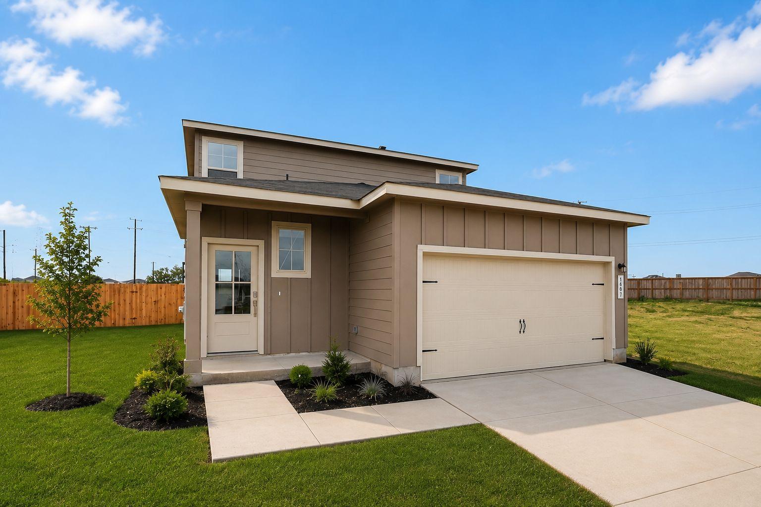 Modern home exterior at Agave in San Antonio, Texas by Davidson Homes with a two-car garage and landscaped front yard.