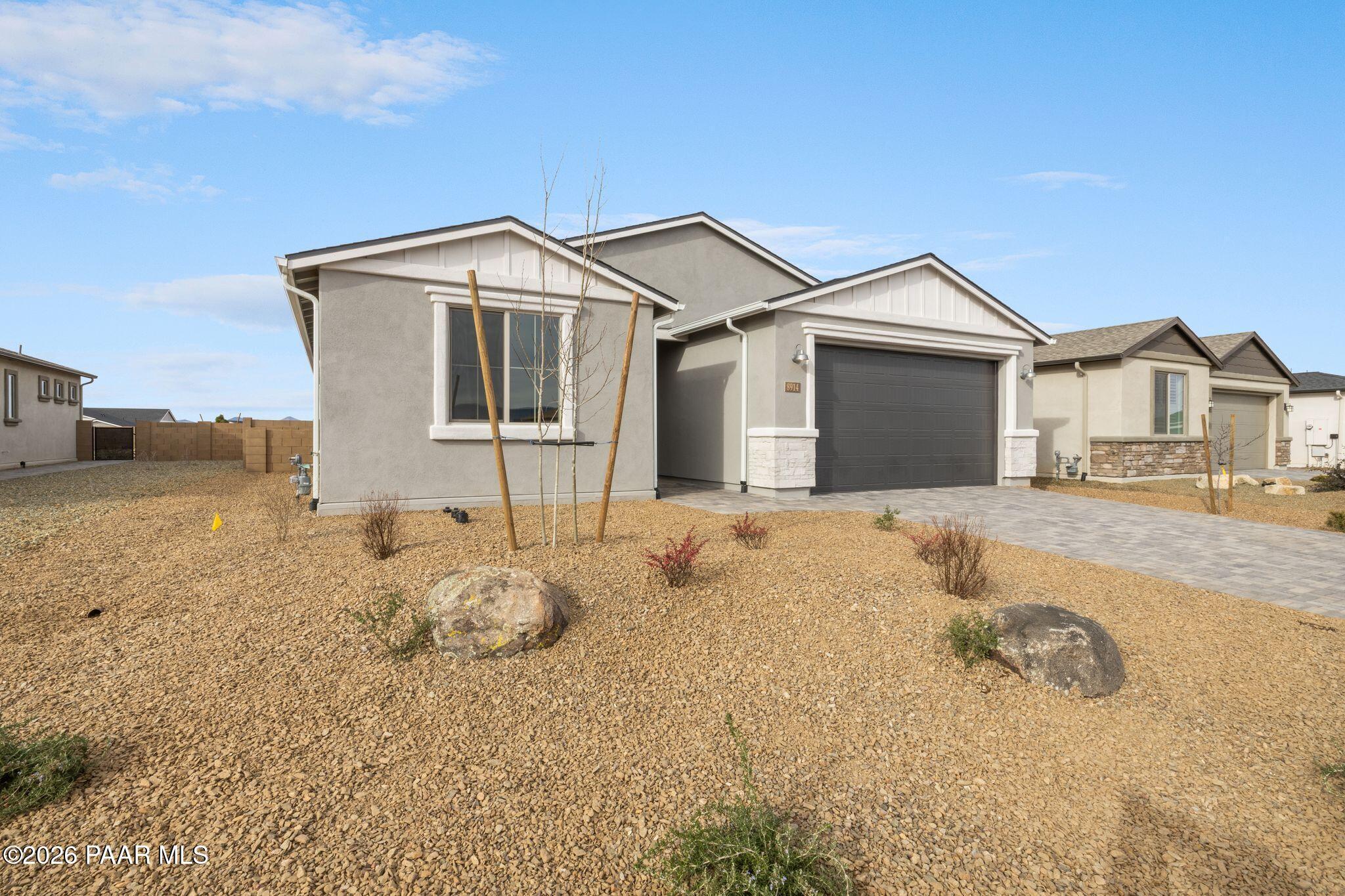 Single-story Davidson Homes Inspiration A floor plan with 3-car garage in North Ridge at Pronghorn Ranch, Prescott Valley.