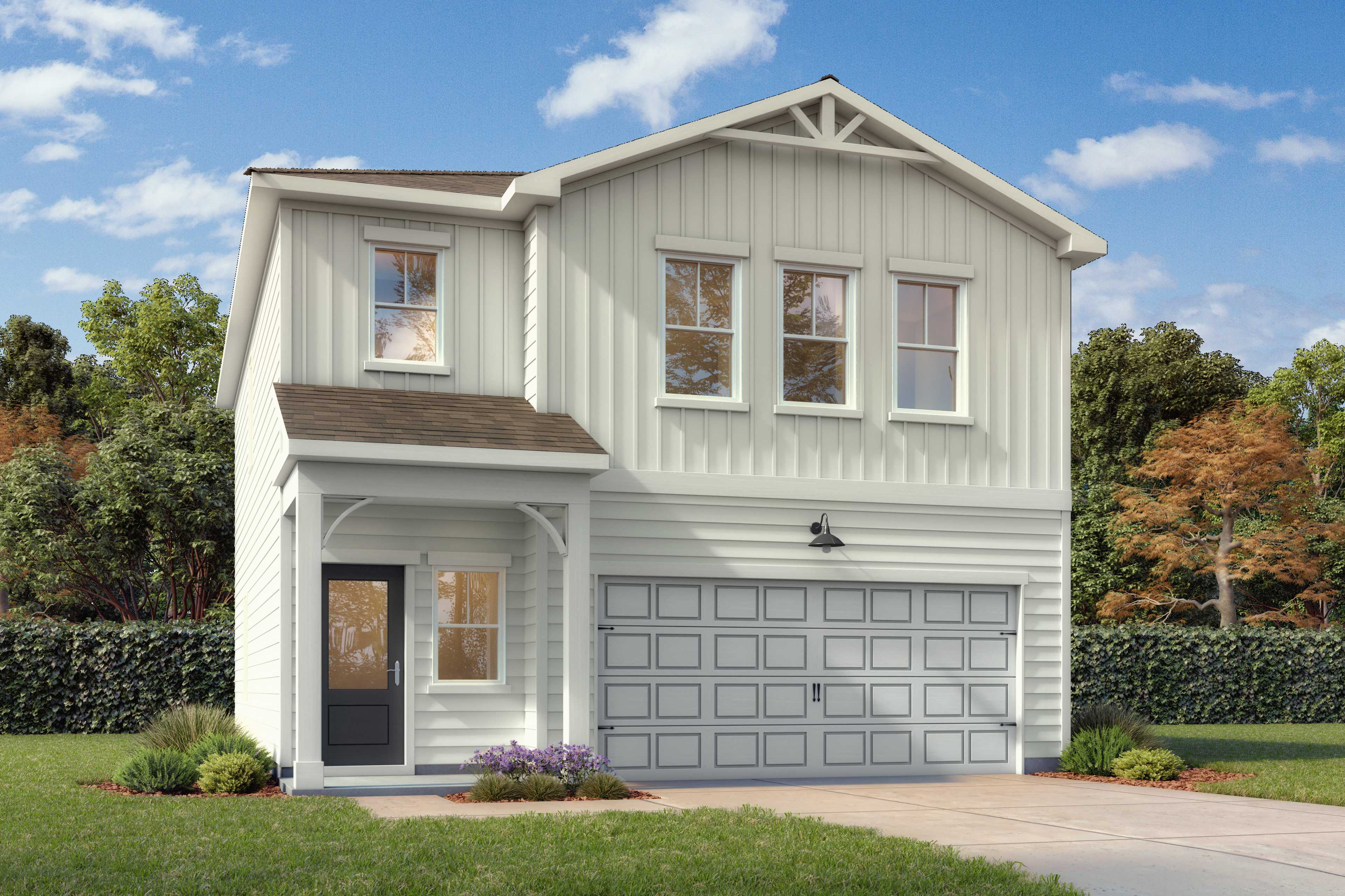 Front exterior of a 2 story home with front patio, 2 car carage