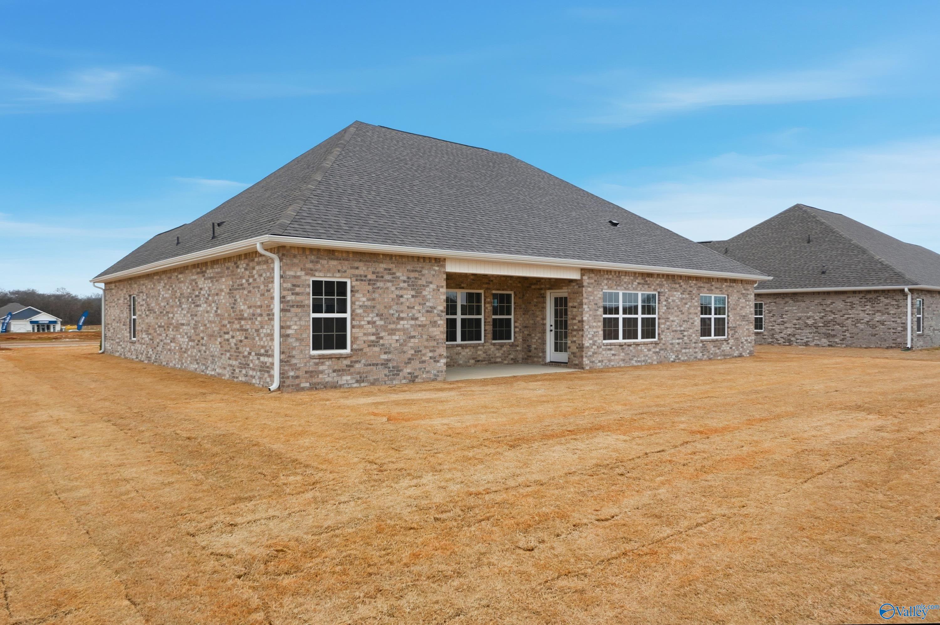 Single-story brick Finleigh home by Davidson Homes with gabled roof, covered porch, and windows in Briercreek, Meridianville, AL