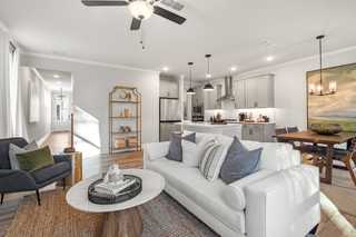 Spacious open-concept living room and kitchen in The Washington H townhome by Davidson Homes, Marietta GA