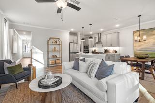 Spacious open-concept living room and kitchen in The Washington H townhome by Davidson Homes, Marietta GA