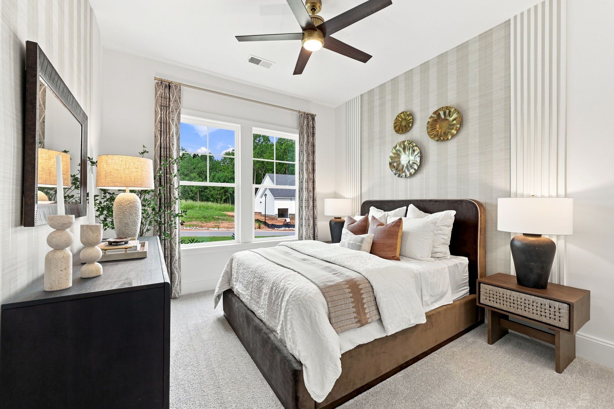 Spacious master suite bedroom in The Barrington C by Davidson Homes, featuring modern decor and natural light.