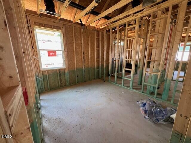 Wood framing interior of a 3-bedroom home under construction in The Carter A floor plan at Gregory Village, Lillington, NC.
