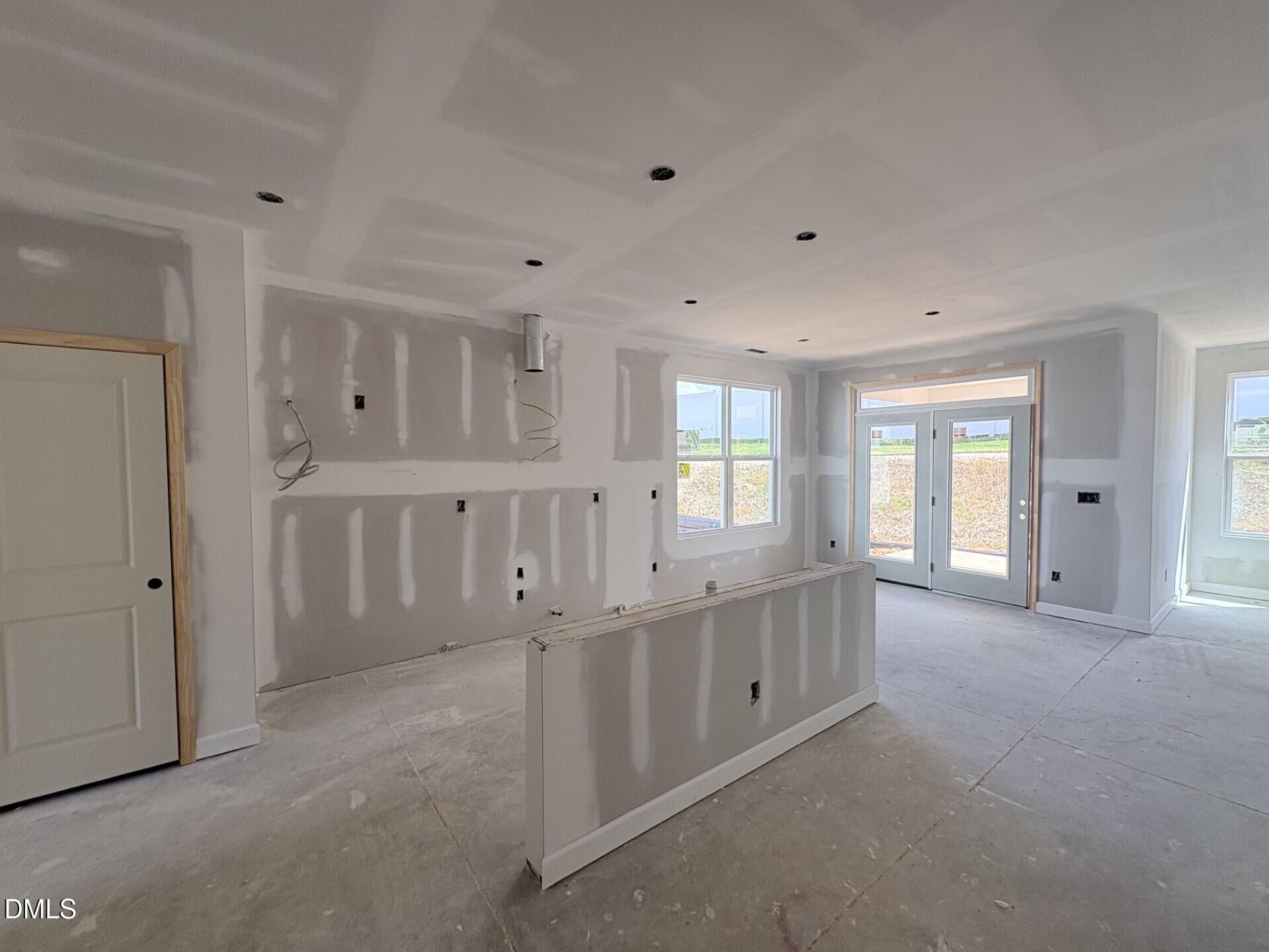 Open-concept construction phase of The Ash C floor plan by Davidson Homes in Woodland Crossing, Zebulon, North Carolina.